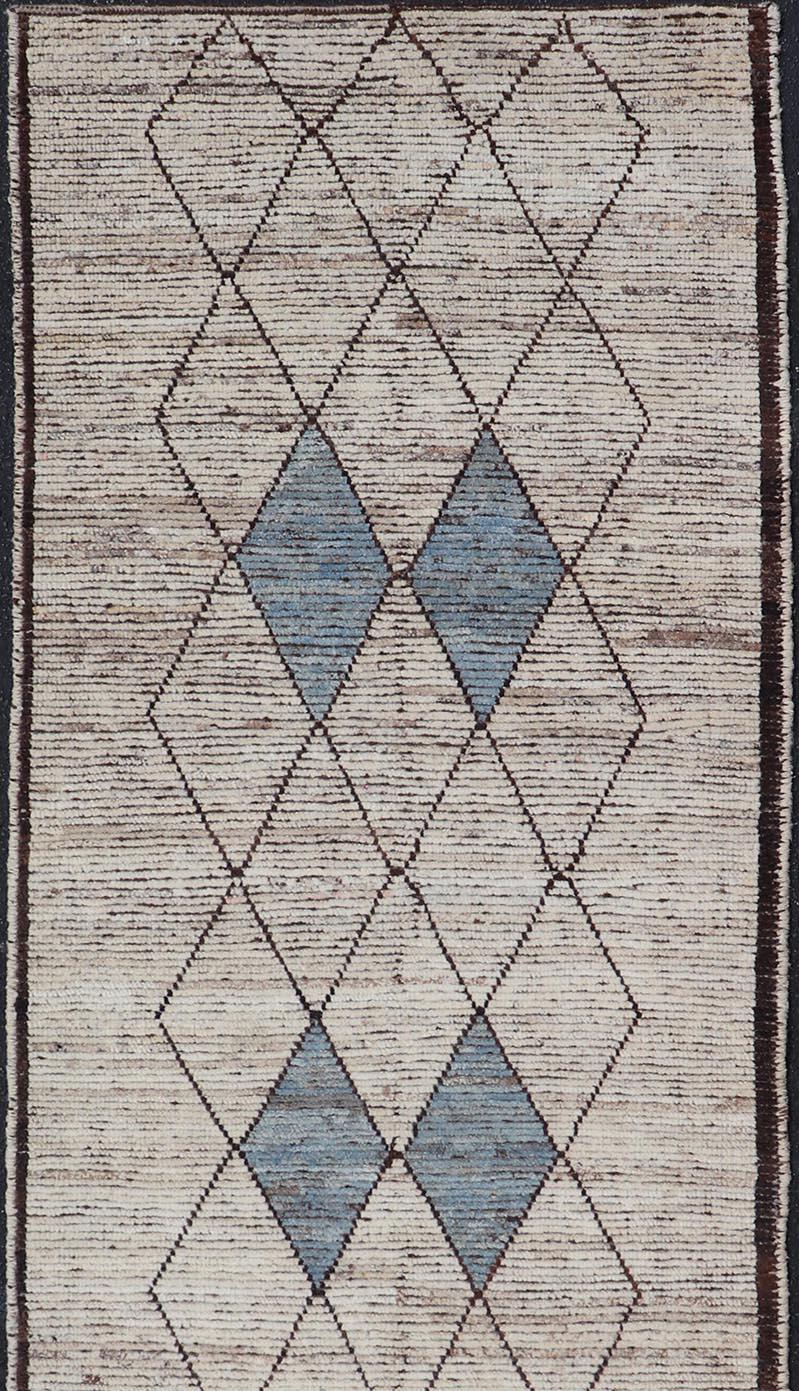 Modern Hand-Knotted Runner in Wool with Diamond Design in Neutral Tones. Keivan Woven Arts; rug SNK-2281, country of origin / type: Afghanistan / Modern Casual, circa Early-21th Century.
Measures: 3'4 x 9'8 
This modern casual tribal runner has