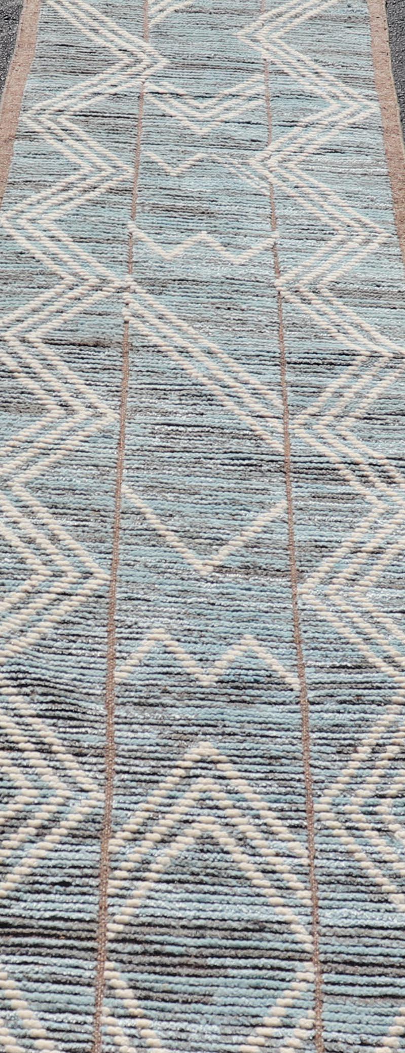 Modern Hand-Knotted Runner in Wool with Diamond Design With Teal, Ivory Tones. Keivan Woven Arts; rug MSE-12769, country of origin / type: Afghanistan / Modern Casual, circa Early-21th Century.
Measures: 2'6 x 10'9 
This modern casual tribal runner