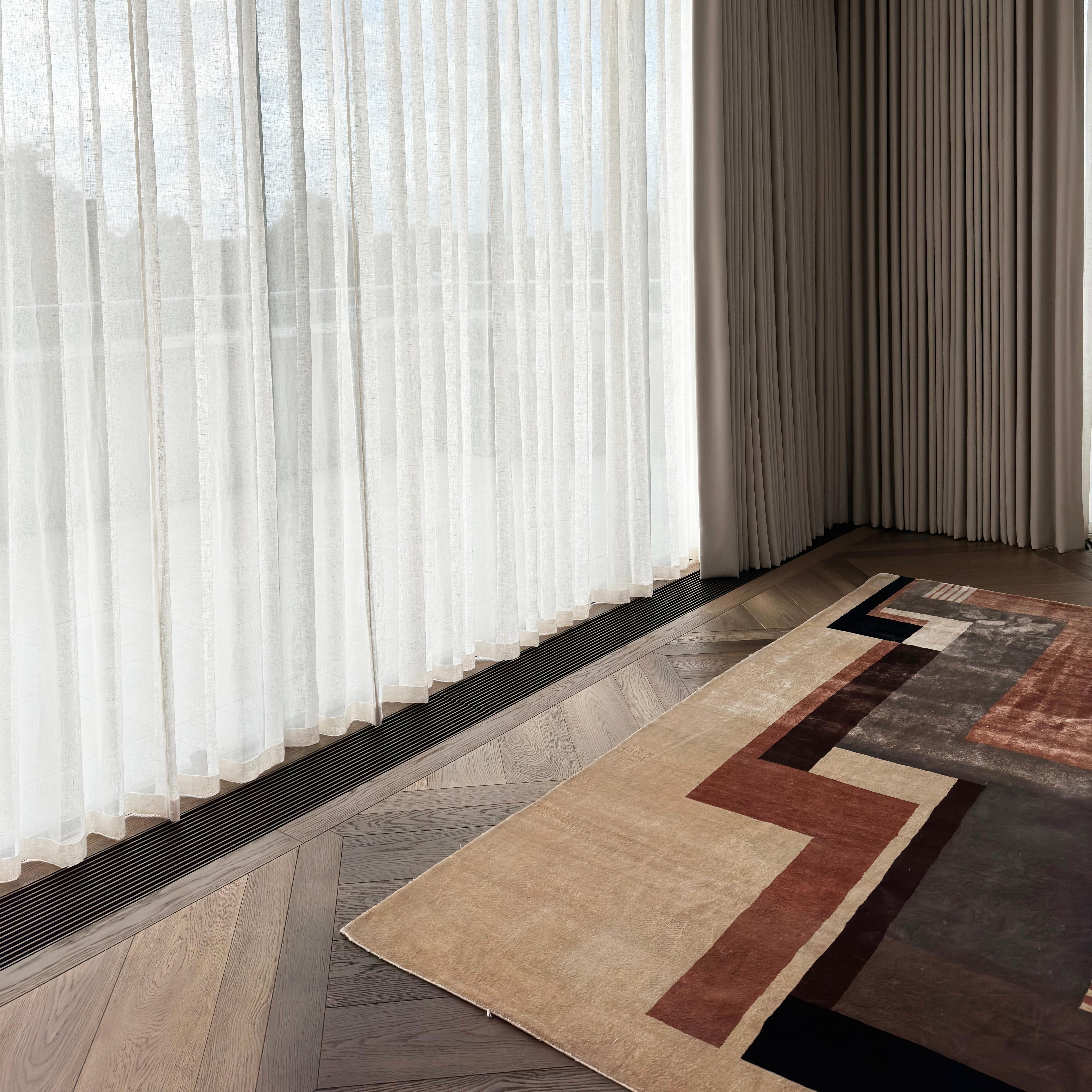 Silk Rug by Galerie Thierry Boccara—an avant-garde marvel drawing inspiration from Ivan Da Silva's 'constructivist' linear pattern, harmonizing Art Deco allure. 

The rug has been hand-knotted with finesse; its palette of muted coral red and natural