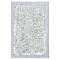 Modern Hand-Knotted Solid Ivory Handmade Wool Carpet "Tulu" by Doris Leslie Blau