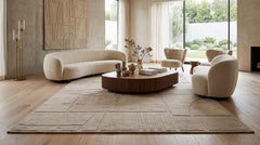 Modern Hand-Loomed Wool Rug in Warm Ivory with Sculpted Geometric Relief Pattern