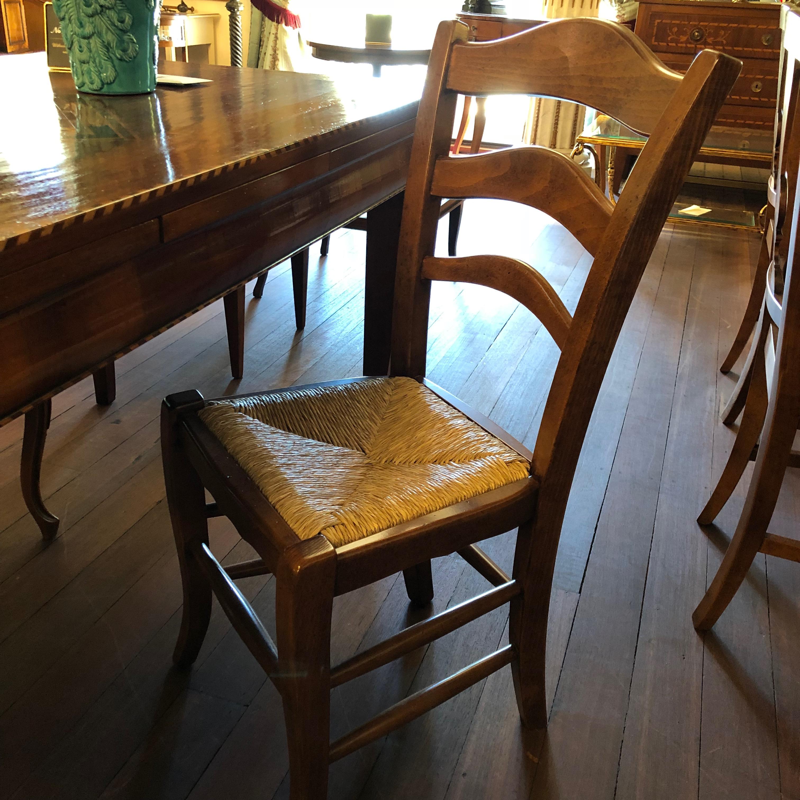 We found these beautiful handcrafted oak chairs in Italy from one of our oldest merchants. They are complete with rush seating and elegant curved ladder-backs. These chairs are incredibly versatile in their styling capabilities and would suit both