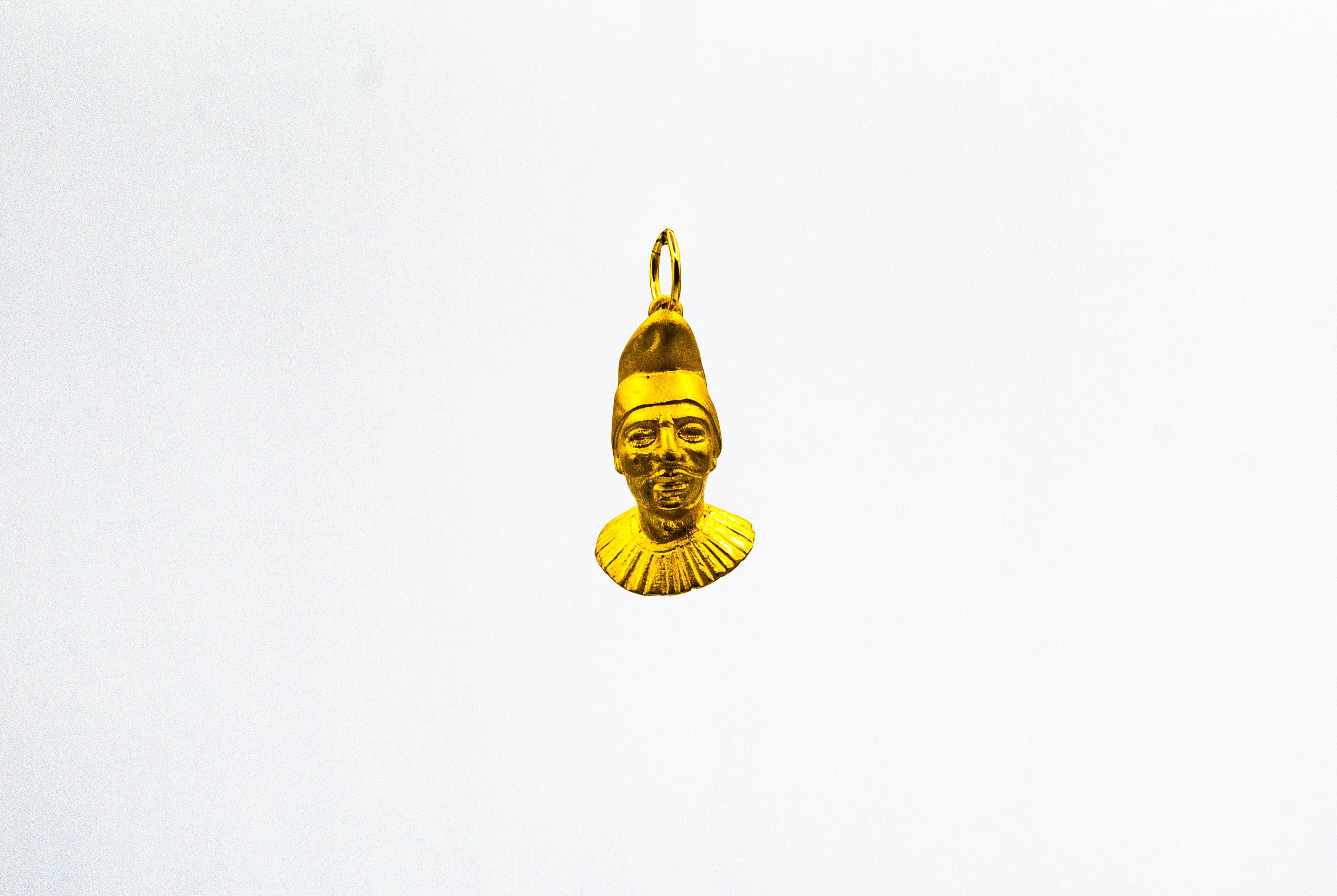 This Necklace is made of 9K Yellow Gold.
This Pendant is available also in 9, 14 or 18K Yellow or White Gold.

As all the Neapolitans know, Pulcinella represents the simple man who tries to face all his problems with a smile. He is always in