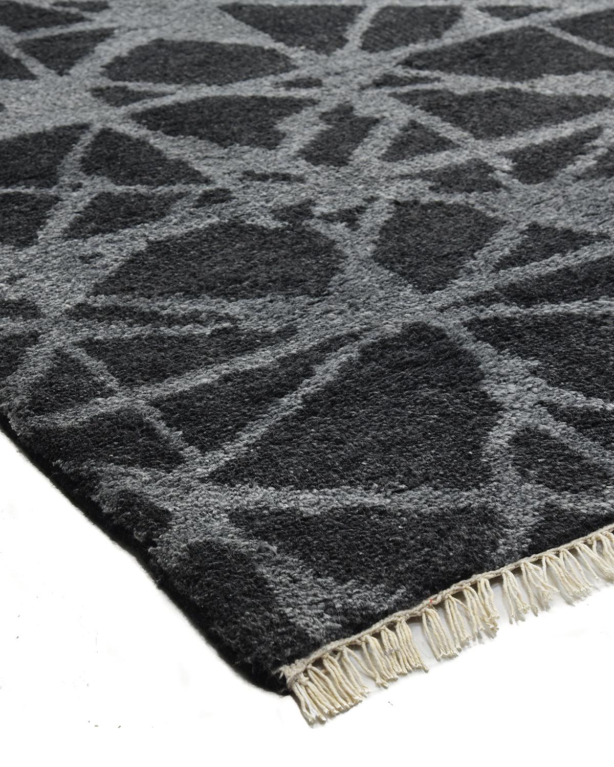 Color: Charcoal - Made In: India. 70% Viscose, 30% Wool. Fresh, spirited, and above all, luxurious, the rugs of the Modern collection can invigorate a traditional room as gracefully as they can ground a more contemporary space. Regardless of their