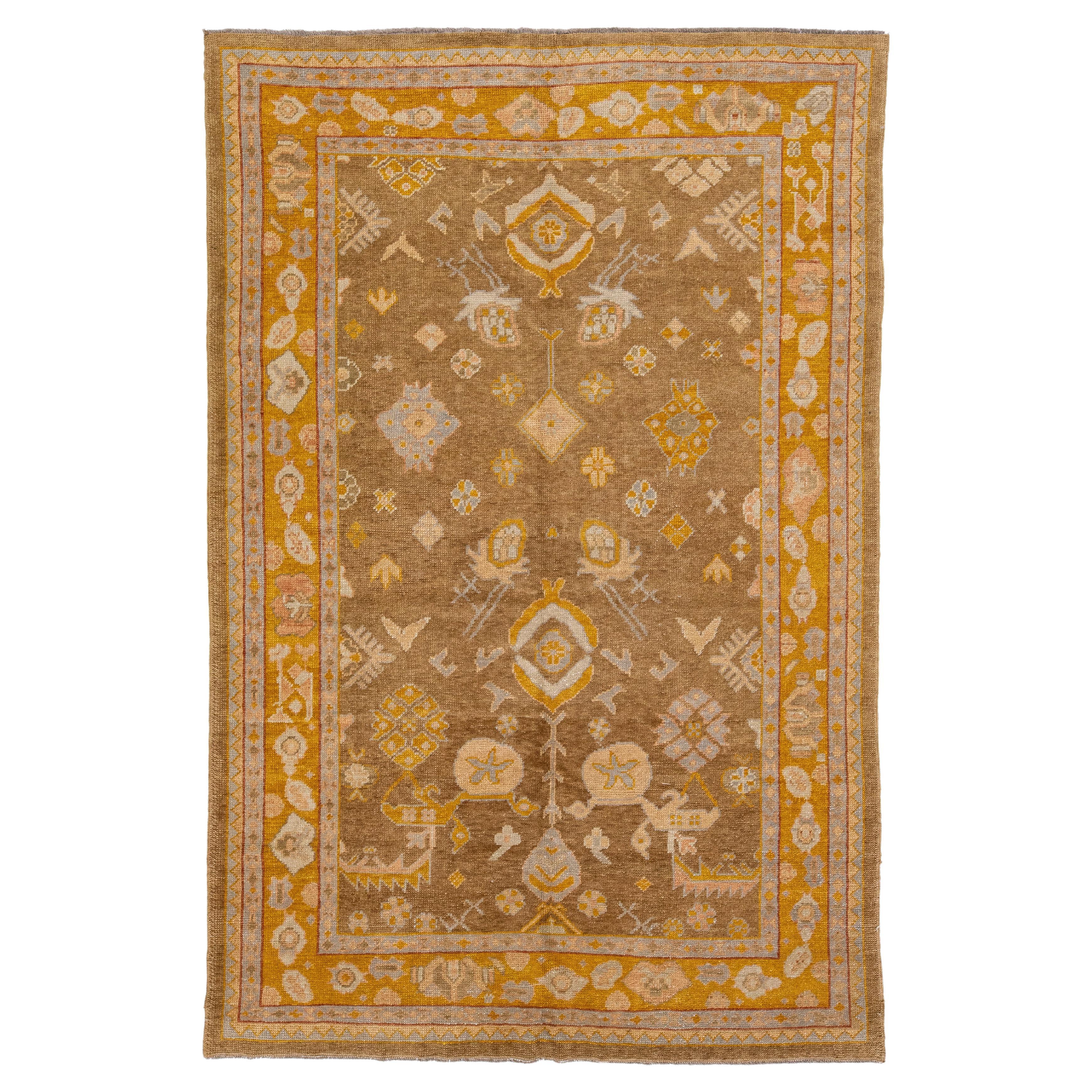 Modern Handmade Brown Turkish Oushak Wool Rug with Floral Design For Sale