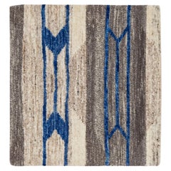 Tappeto moderno fatto a mano geometrico personalizzato in lana beige