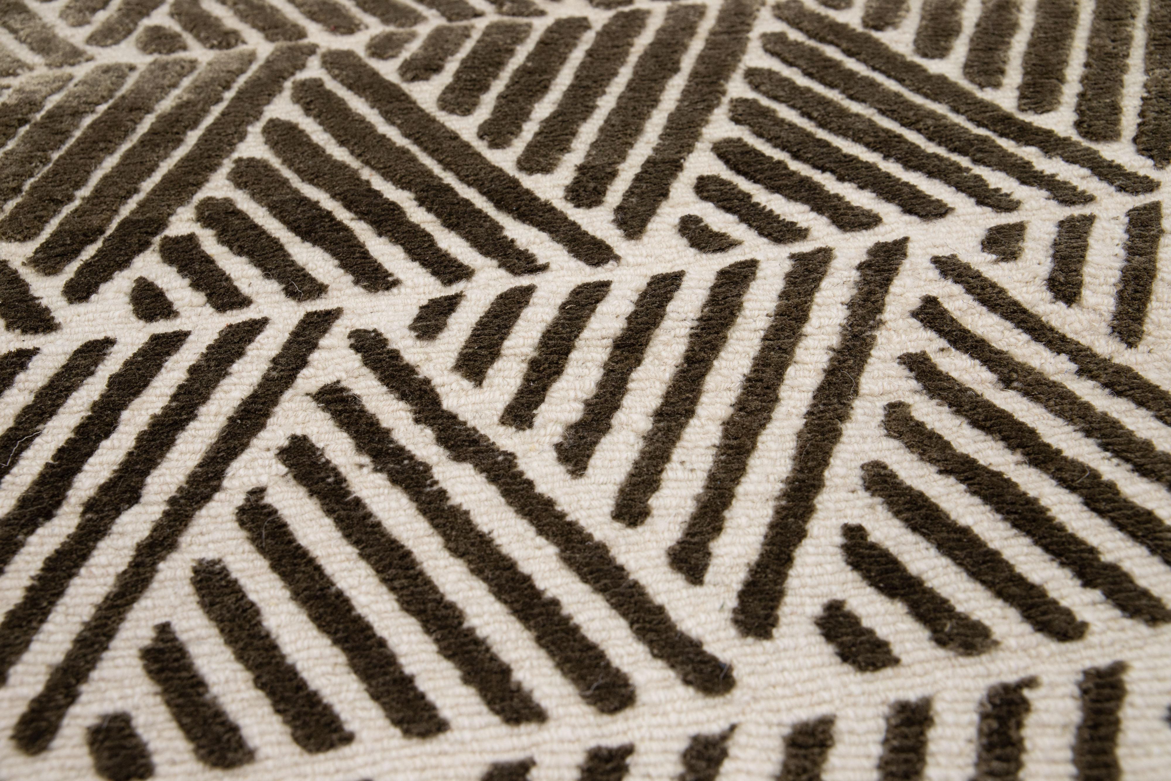 Apadana's Modern wool and silk custom rug. Custom sizes and colors made-to-order.

Material: 100 Knots, 50 Wool and 50 Silk.
Techniques: hand knotted.
Style: Modern.
Lead time: Approx. 15-16 weeks available.
Colors: As shown, other custom