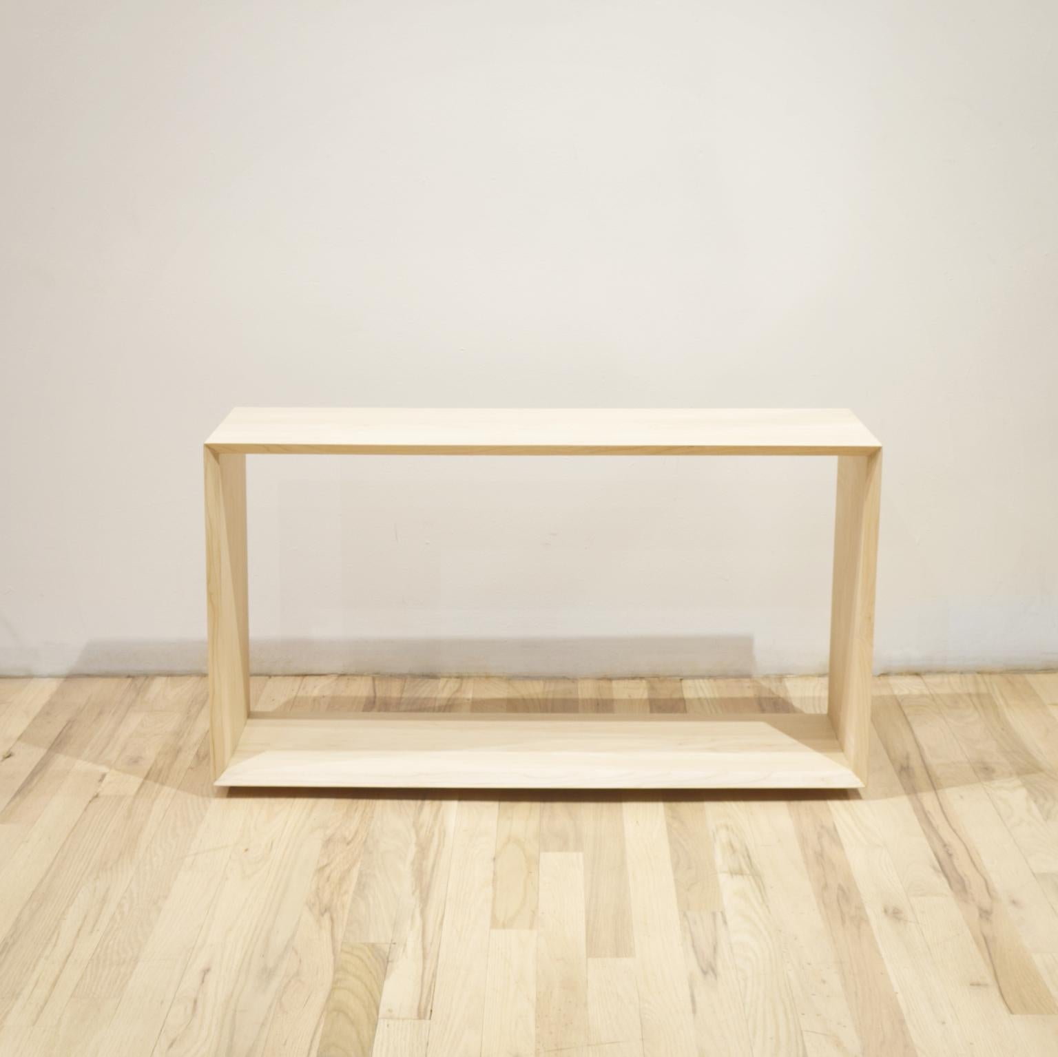 The simple frame table can be used as a coffee, display, and accent table for your rare accoutrement. Waterfall grain matched edges meet in double mitered joints. This table is as versatile as your imagination. 


Own a figure ground