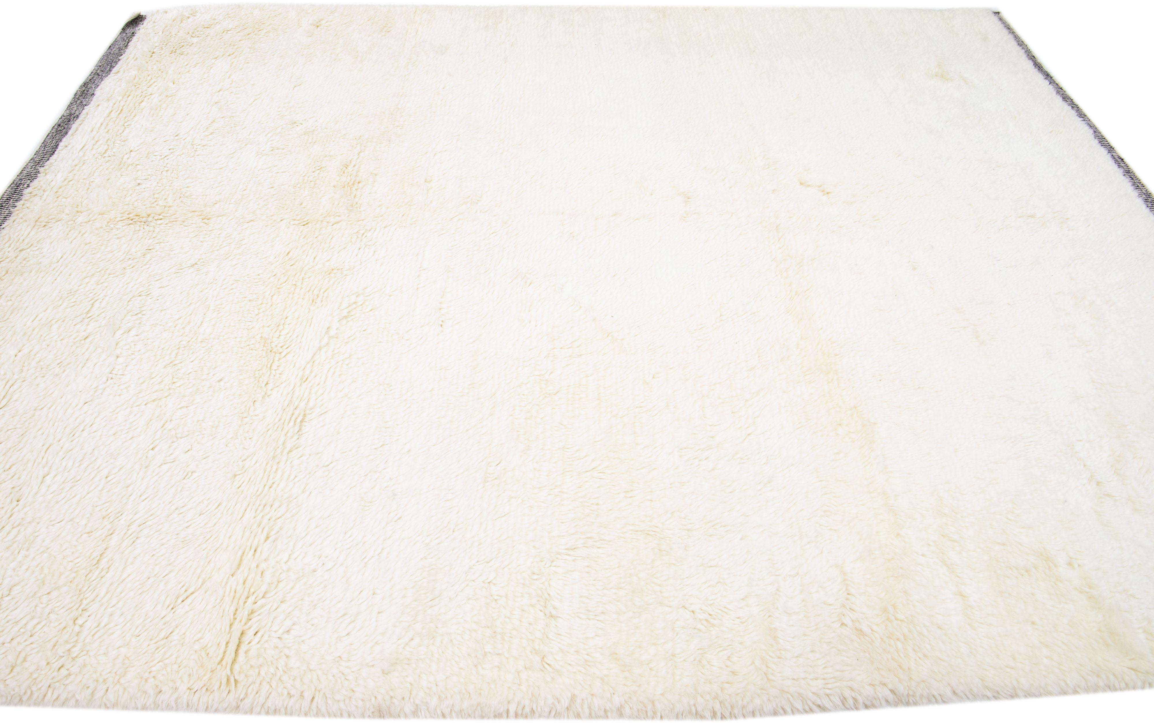 Pakistani Modern Handmade Moroccan Style Wool Rug With Ivory Solid Field For Sale