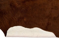 Moderner moderner handgefertigter, rustikaler, brauner Rindslederteppich