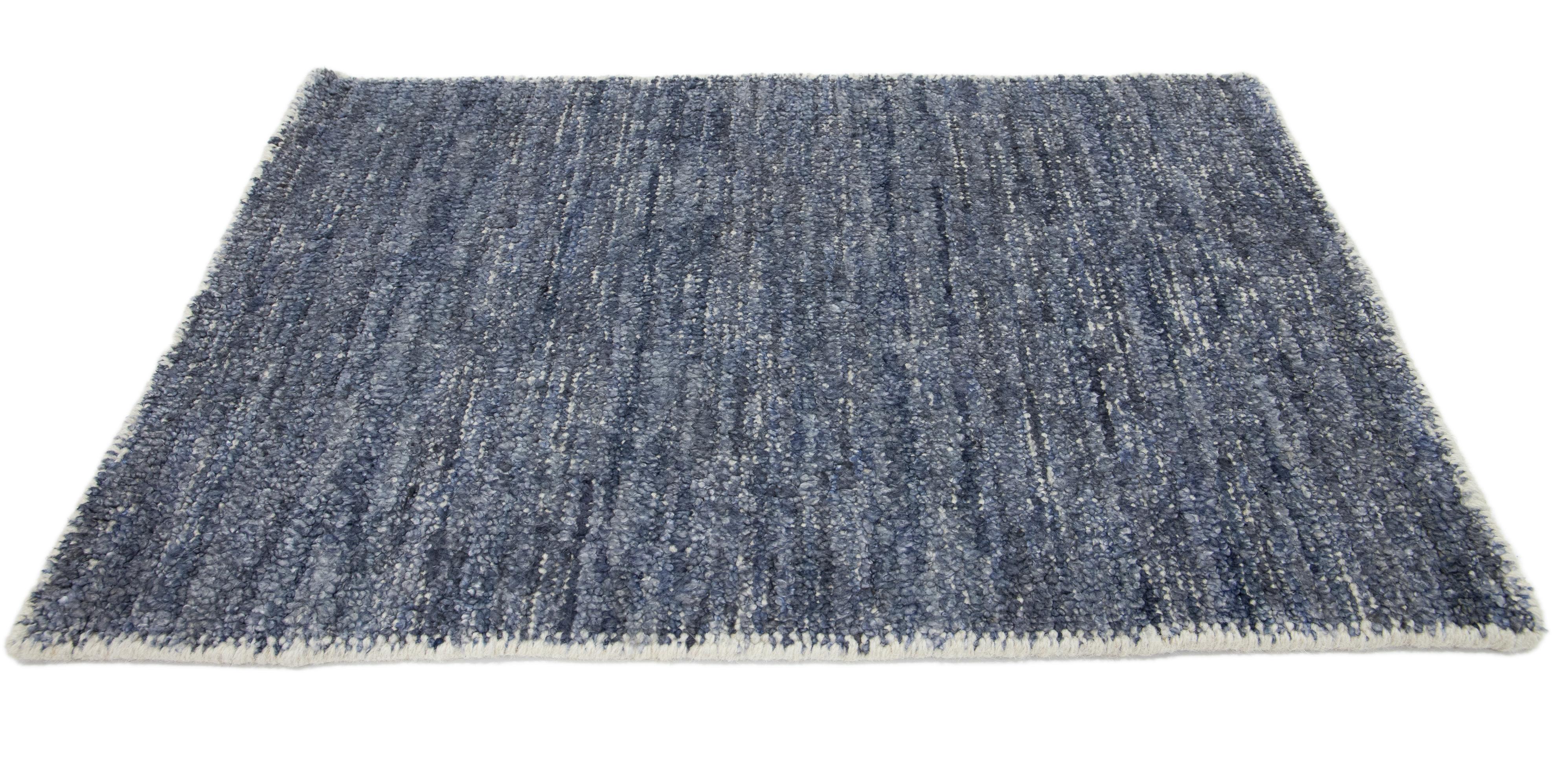 Apadana's Modern Solid custom rug. Custom sizes and colors made-to-order. 

Material: 65% Viscose, 15% Wool, and 20% Cotton.
Techniques: Hand-Woven
Style: Solid-Modern
Lead time: Approx. 15-16 wks available 
Colors: As shown, other custom colors are