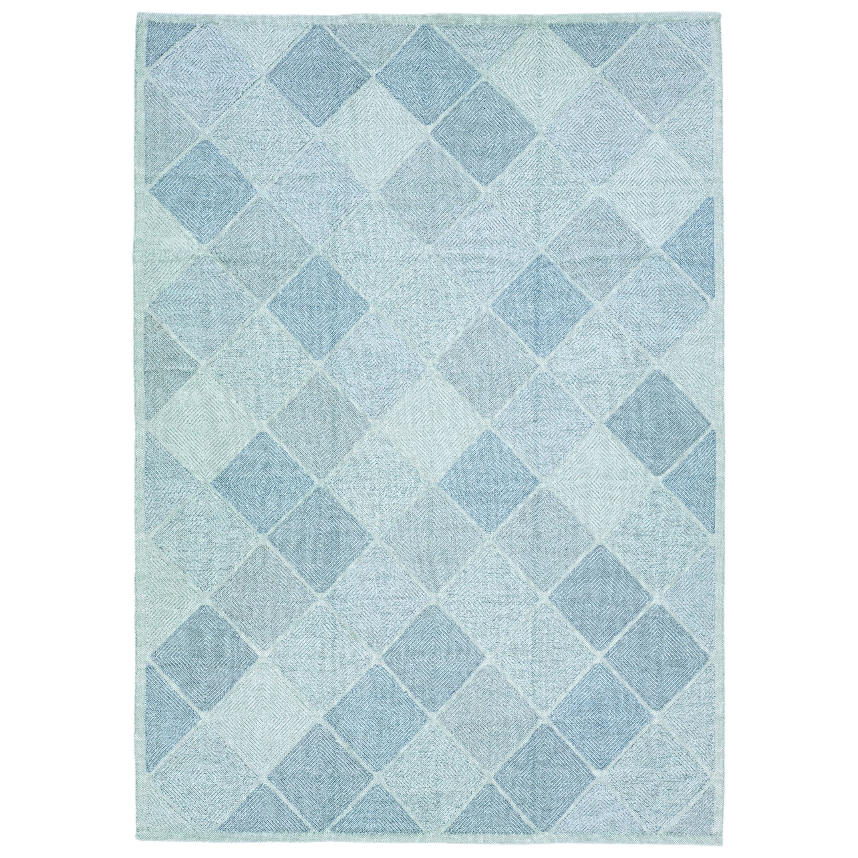 Moderner handgefertigter Wollteppich im schwedischen Stil mit trkisfarbenem, geometrischem Design im Angebot