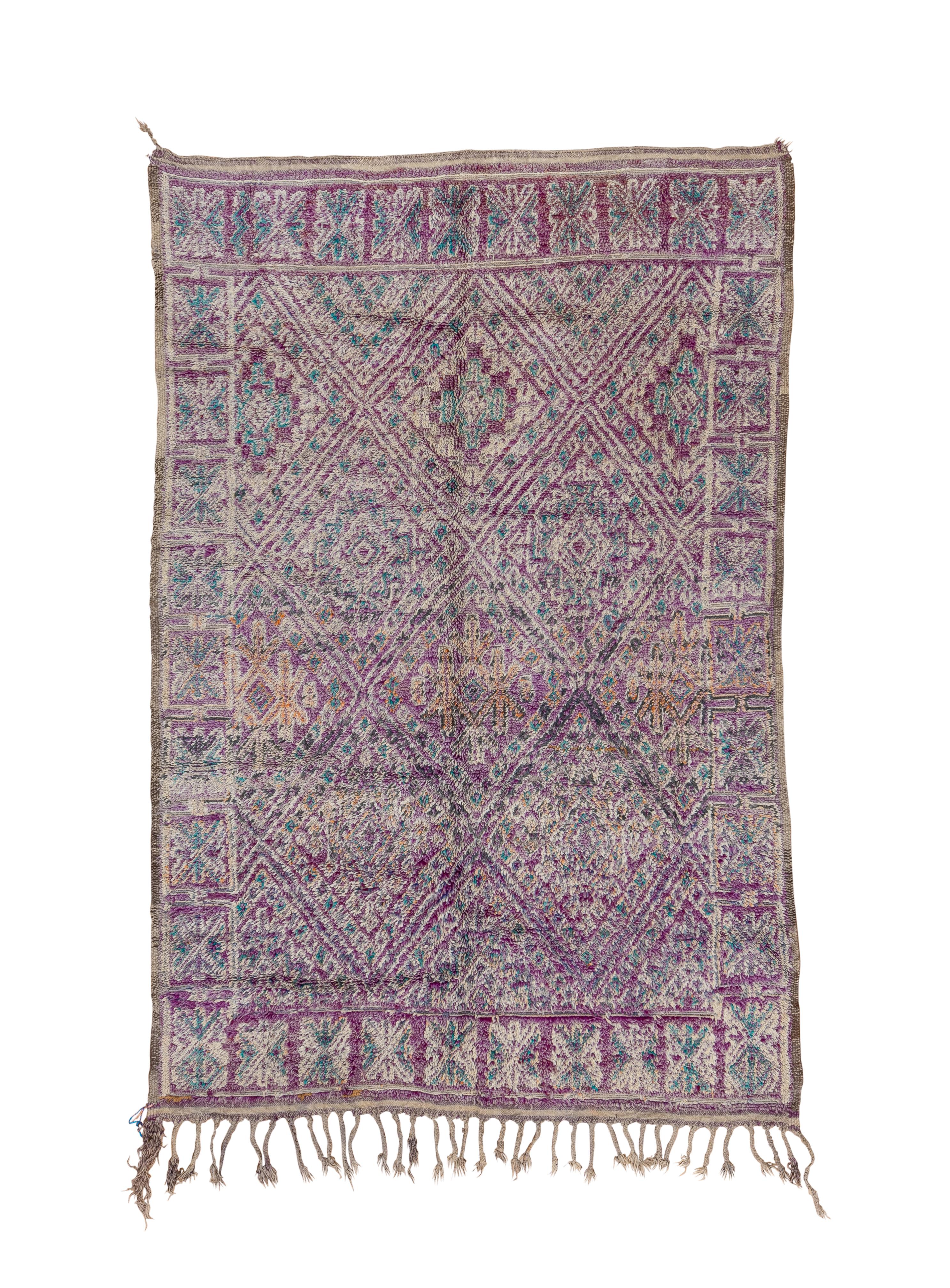 Modern plush handwoven rug with geometric center motifs.
Morocco circa 1940s

Rug Measures
4'9x7'6.