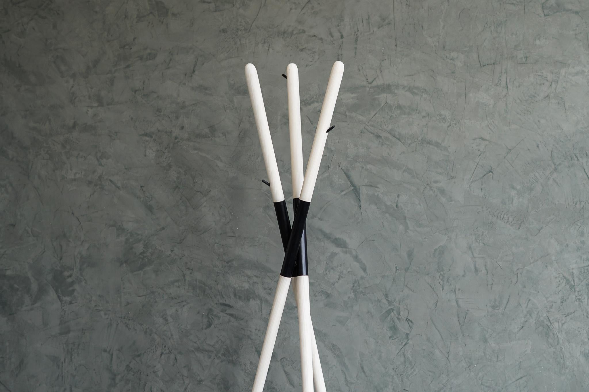 The Hashi coat rack is designed after a widely known tool, the chopsticks. Created from bleached ash and blackened steel. The Hashi mimics the simplicity and timelessness of this ancient tool used daily by millions around the globe.