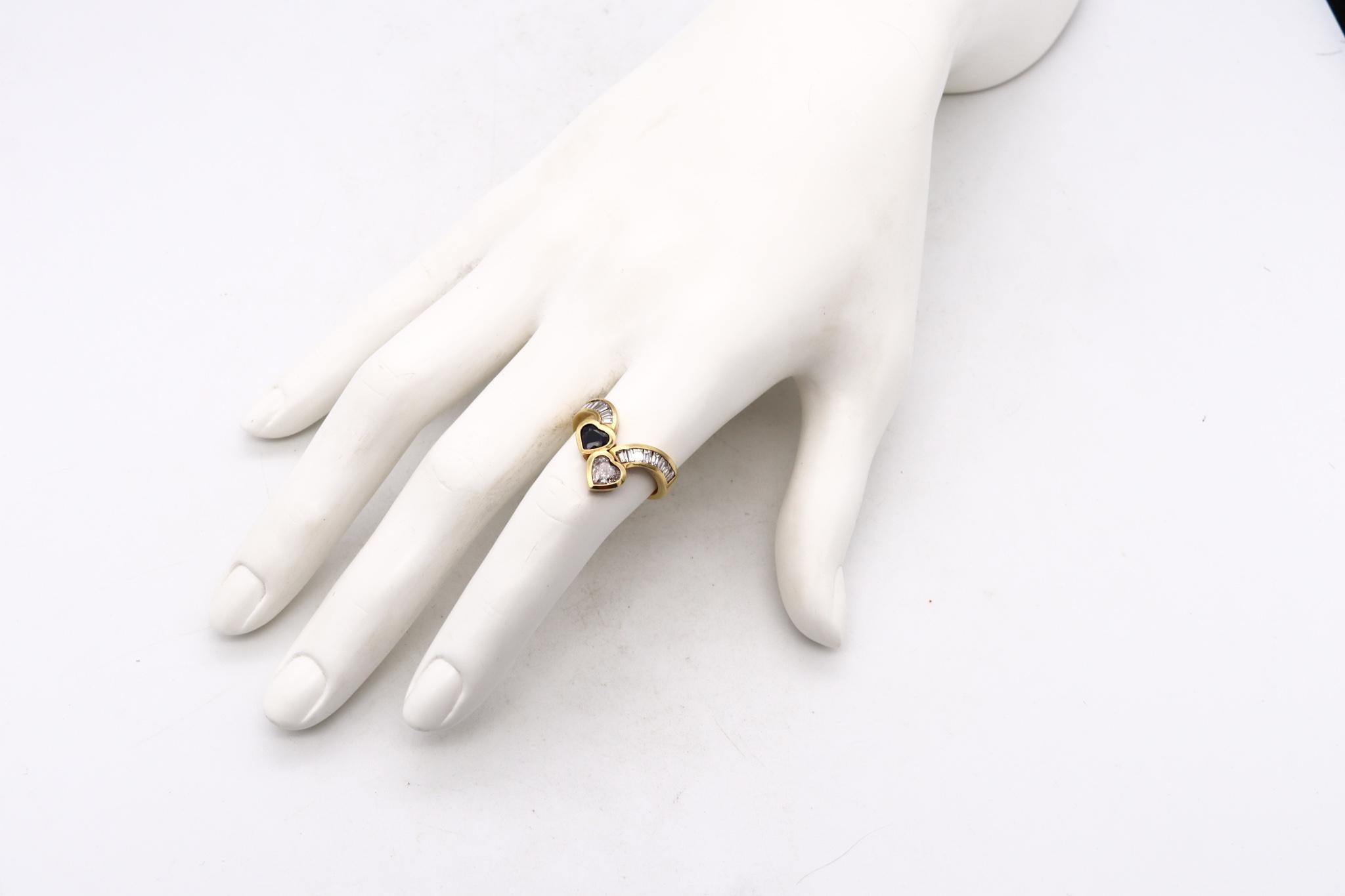 Modern Toi et Moi ring with fancy hearts cuts gemstones. 

Beautiful modernist piece made in the city of Alessandria in Italy. This ring has been crafted in the shape of a Toi et Moi, in solid yellow gold of 18 karats with high polished finish.

The