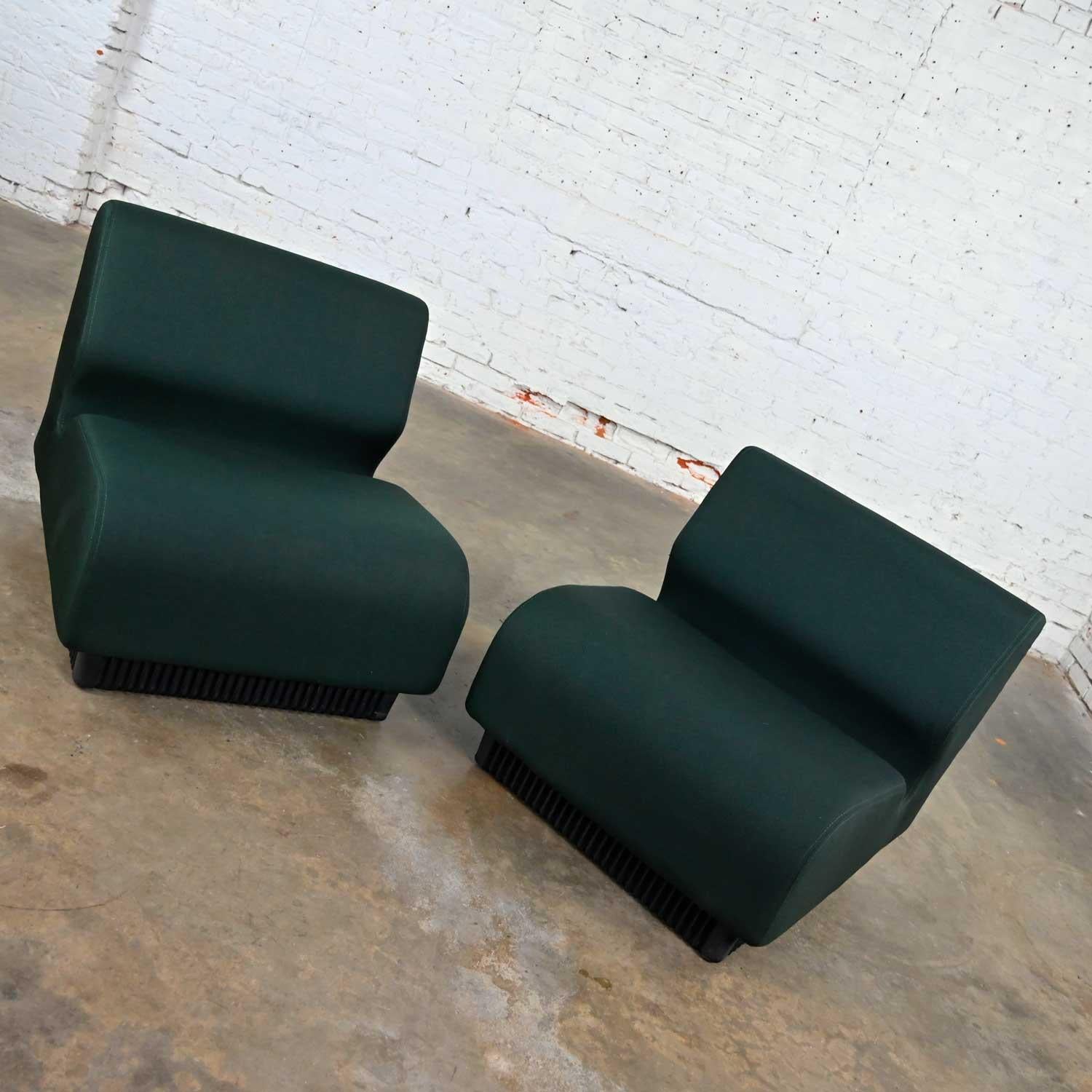 Wonderful modern Herman Miller Don Chadwick modular seating pair of chairs in forest green. Beautiful condition, keeping in mind that these are vintage and not new so will have signs of use and wear. These have been professionally cleaned and are