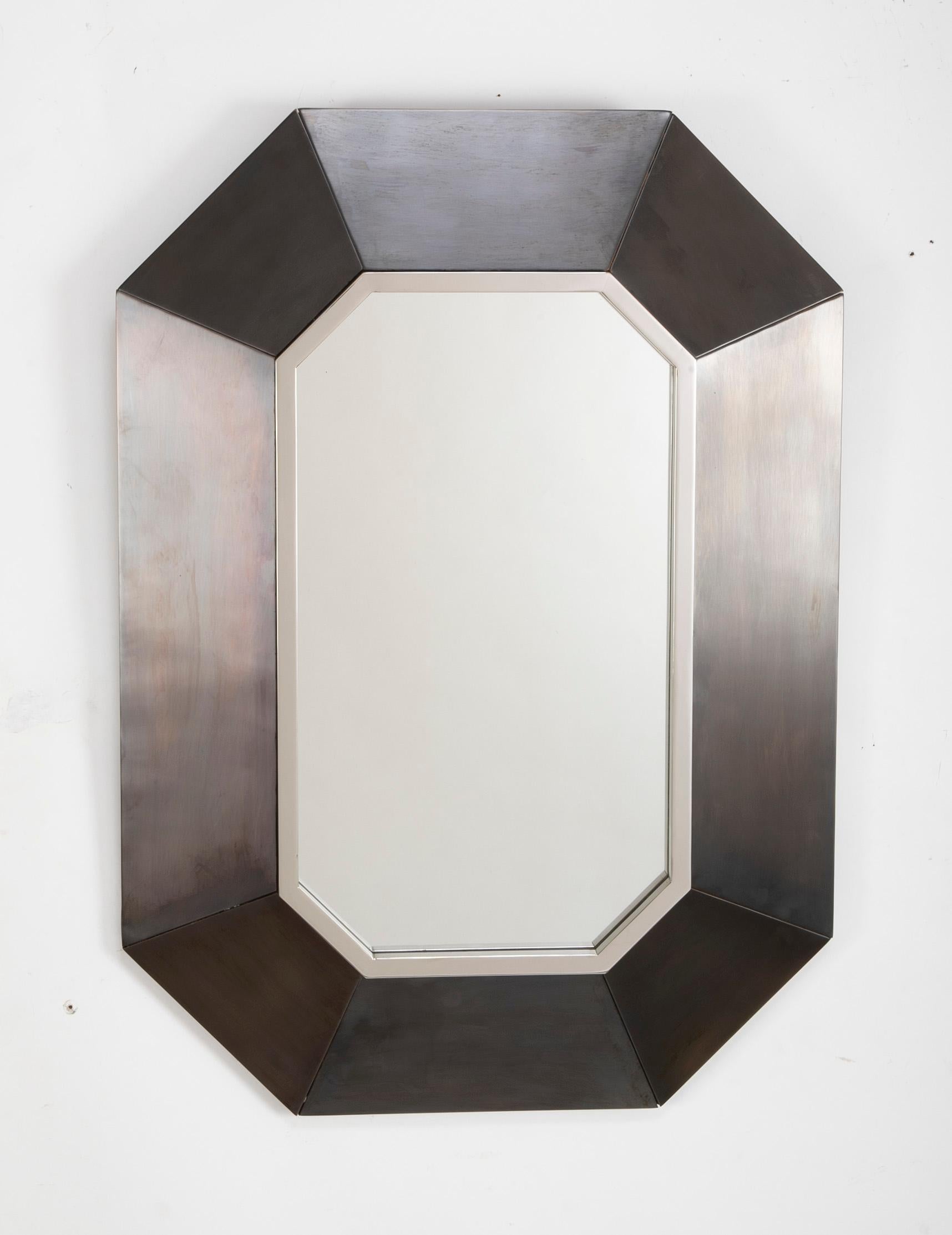 Modern hexagonal shape wall mirror in brushed steel frame in the manner of Maison Jansen.