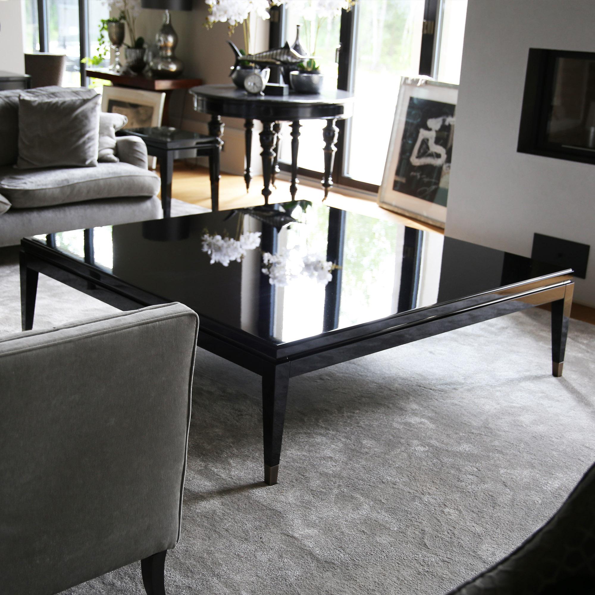 The Polaris low center table from the Polaris Collection is the elegant anchor for all the other furniture in the room. This statement piece in high gloss black finish gives a deeply luxurious appearance. In unusual large size, this furniture piece
