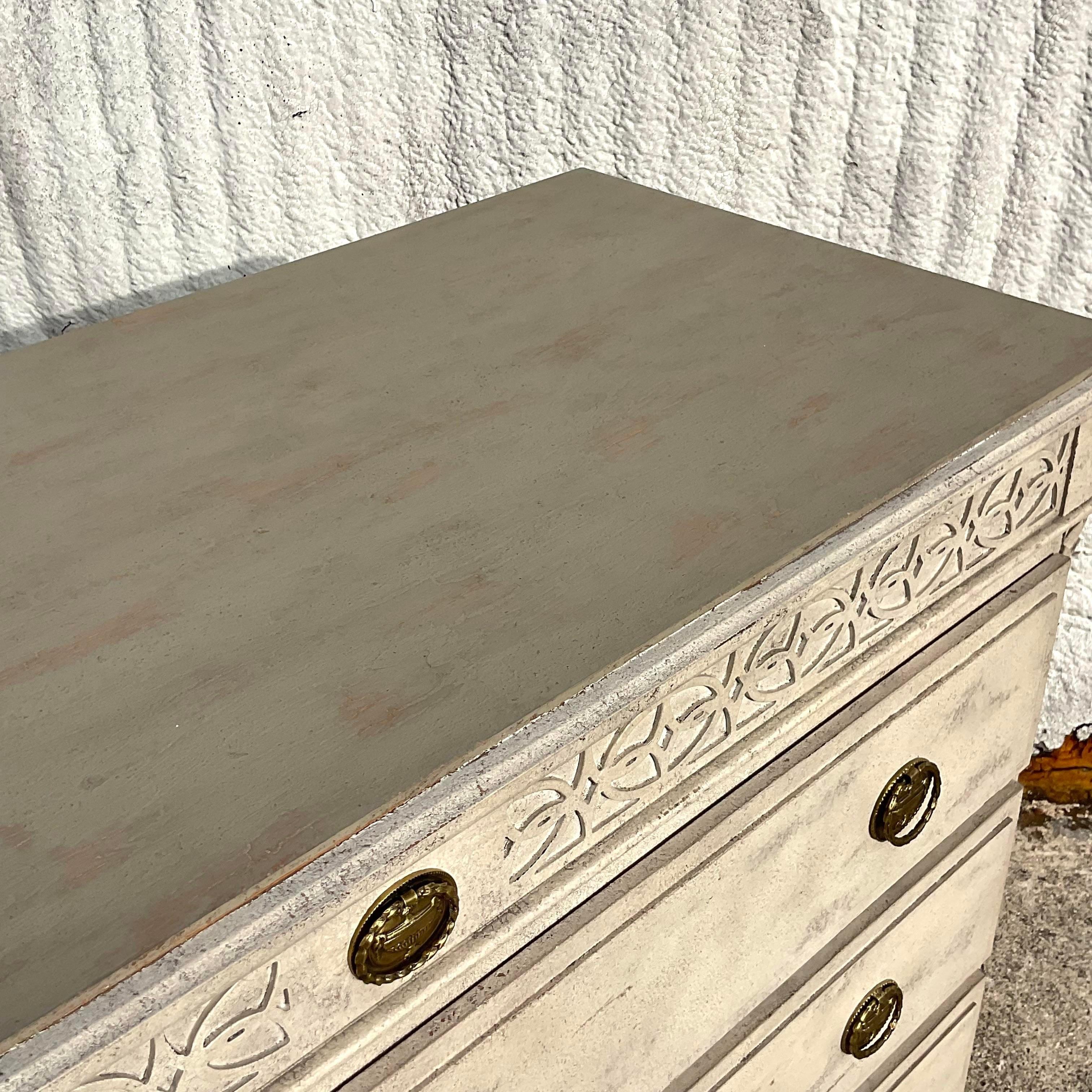 A fantastic vintage Boho chest of drawers. Made by the iconic Modern History group. A chic classic Gustavian style cabinet with a fretwork trim and white washed finish. Large and impressive. Acquired from the estate of the celebrated designer Lars