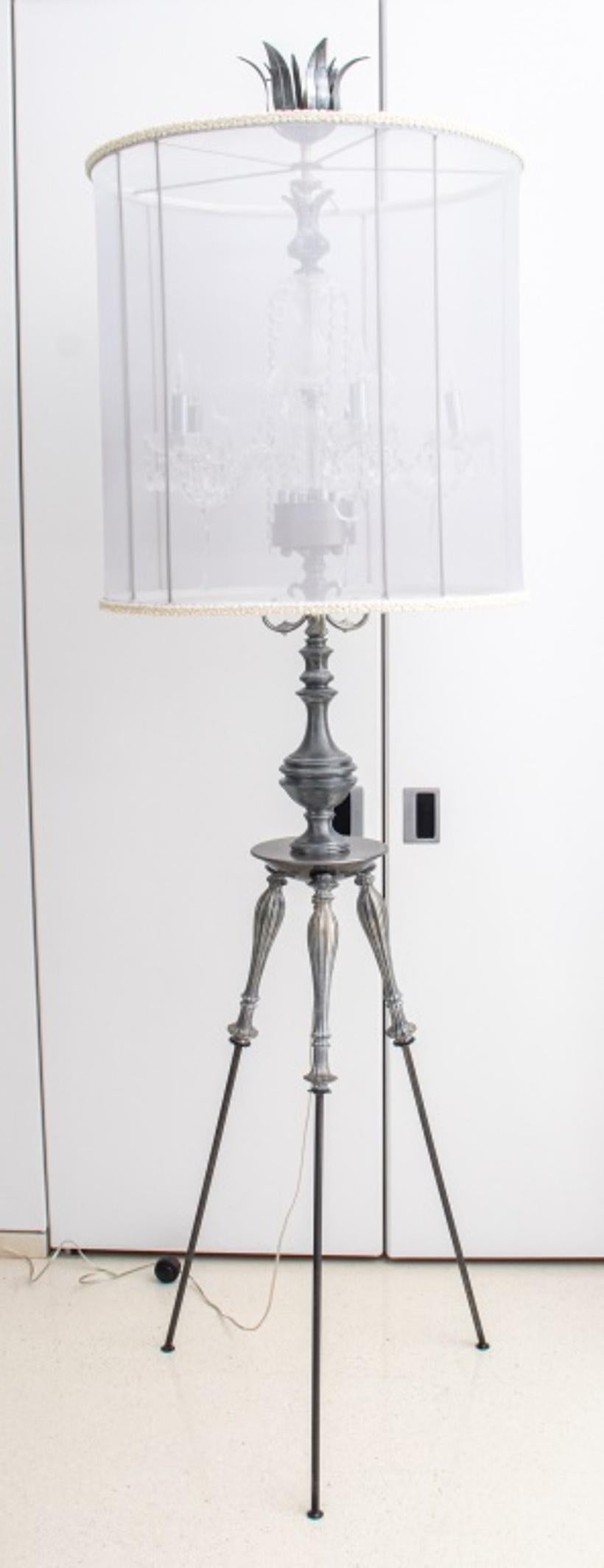 Modern Hollywood Regency five-arm chandelier floor lamp, surrounded by a gray georgette lamp shade, that is trimmed with faux pearls and topped by a large floral finial, and resting on a silver-toned decorative tripod base, unmarked. In good
