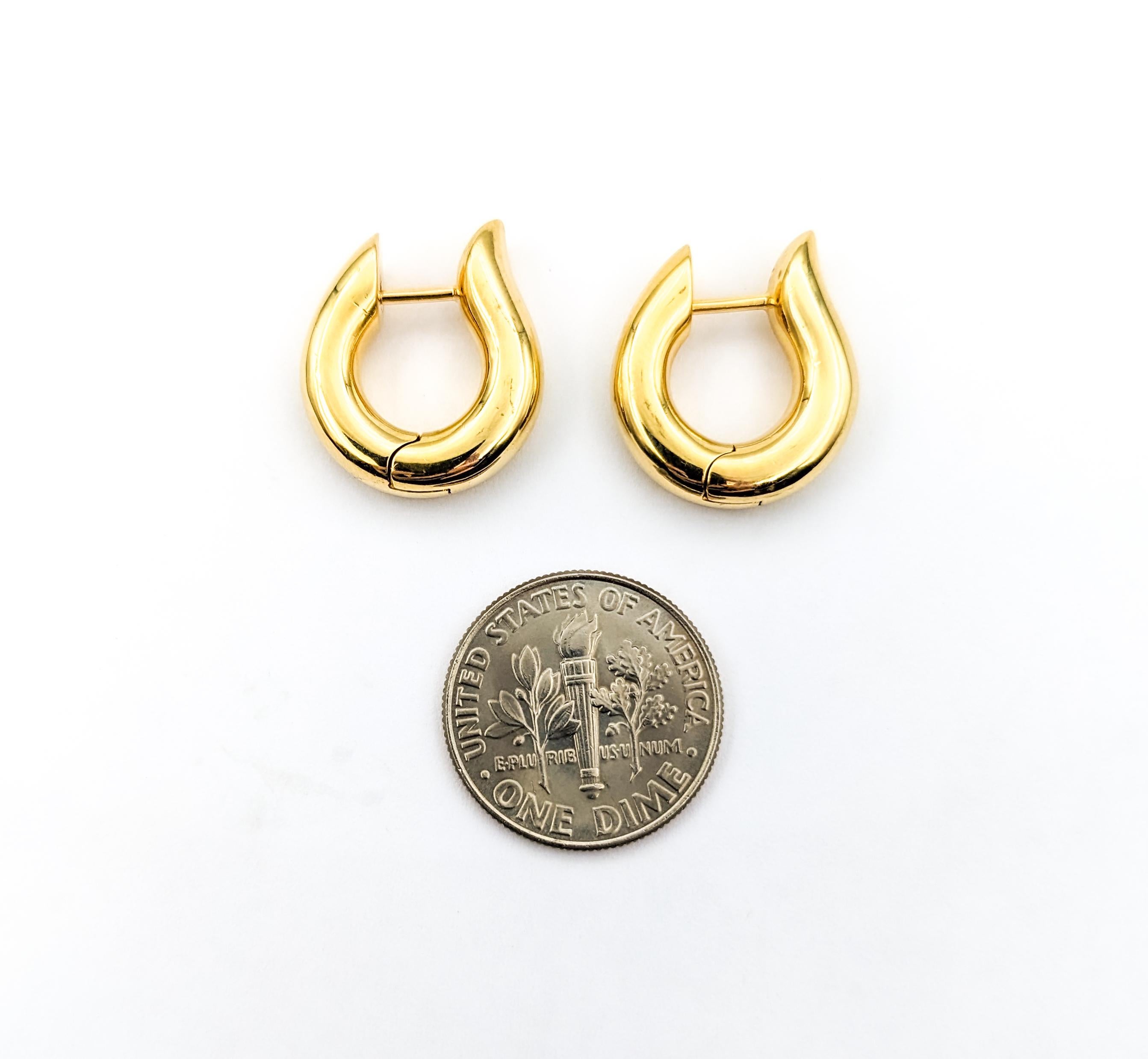 Modern Huggies Earrings In Yellow Gold

Introducing these elegant Gold Huggie Hoop Earrings, expertly crafted in lustrous 18k Yellow Gold. These huggies boast a sleek and modern design, offering a sophisticated touch to any ensemble. Measuring