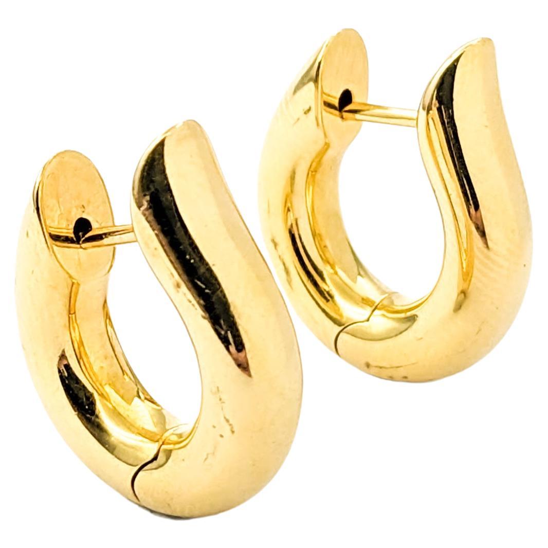 Modern Huggies Earrings In Yellow Gold For Sale