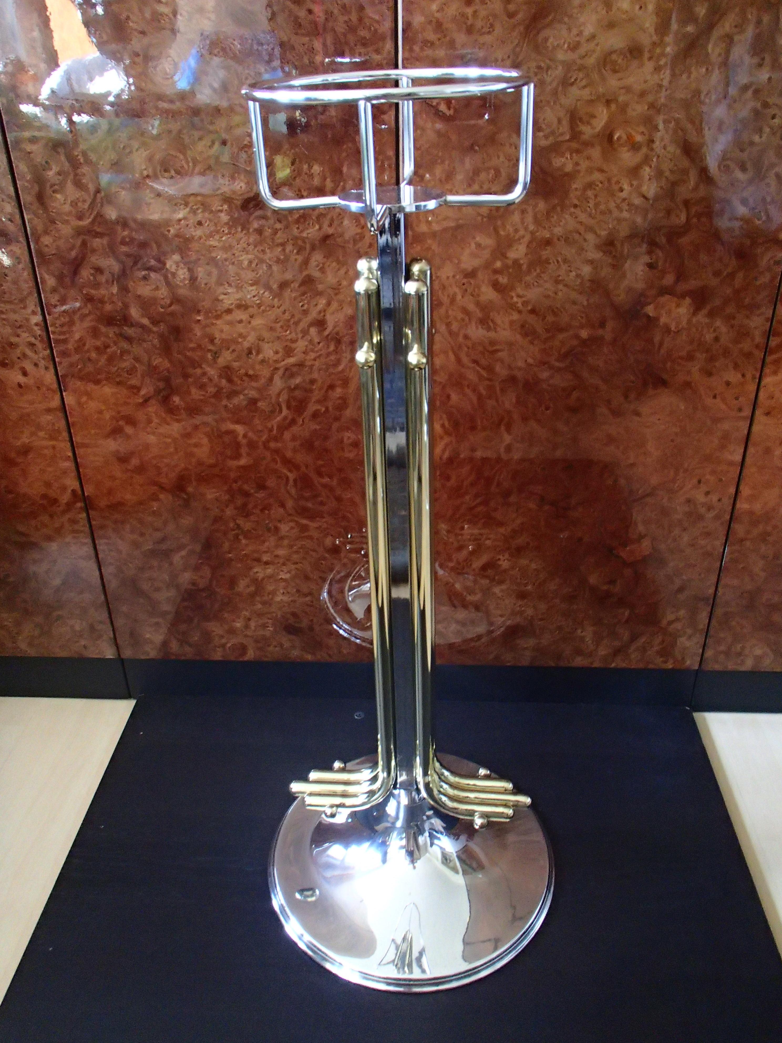 Modern Hugh wine cooler with stand bras and silver plated.
