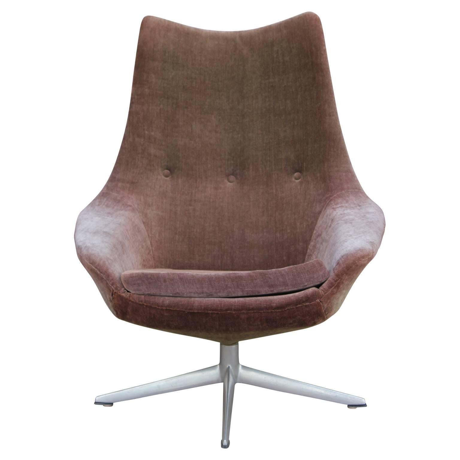 H.W. Klein for Bramin Møbler, upholstered in original fabric with an aluminum base. A great example of Scandinavian design and comfort that would be perfect to modernize any space.