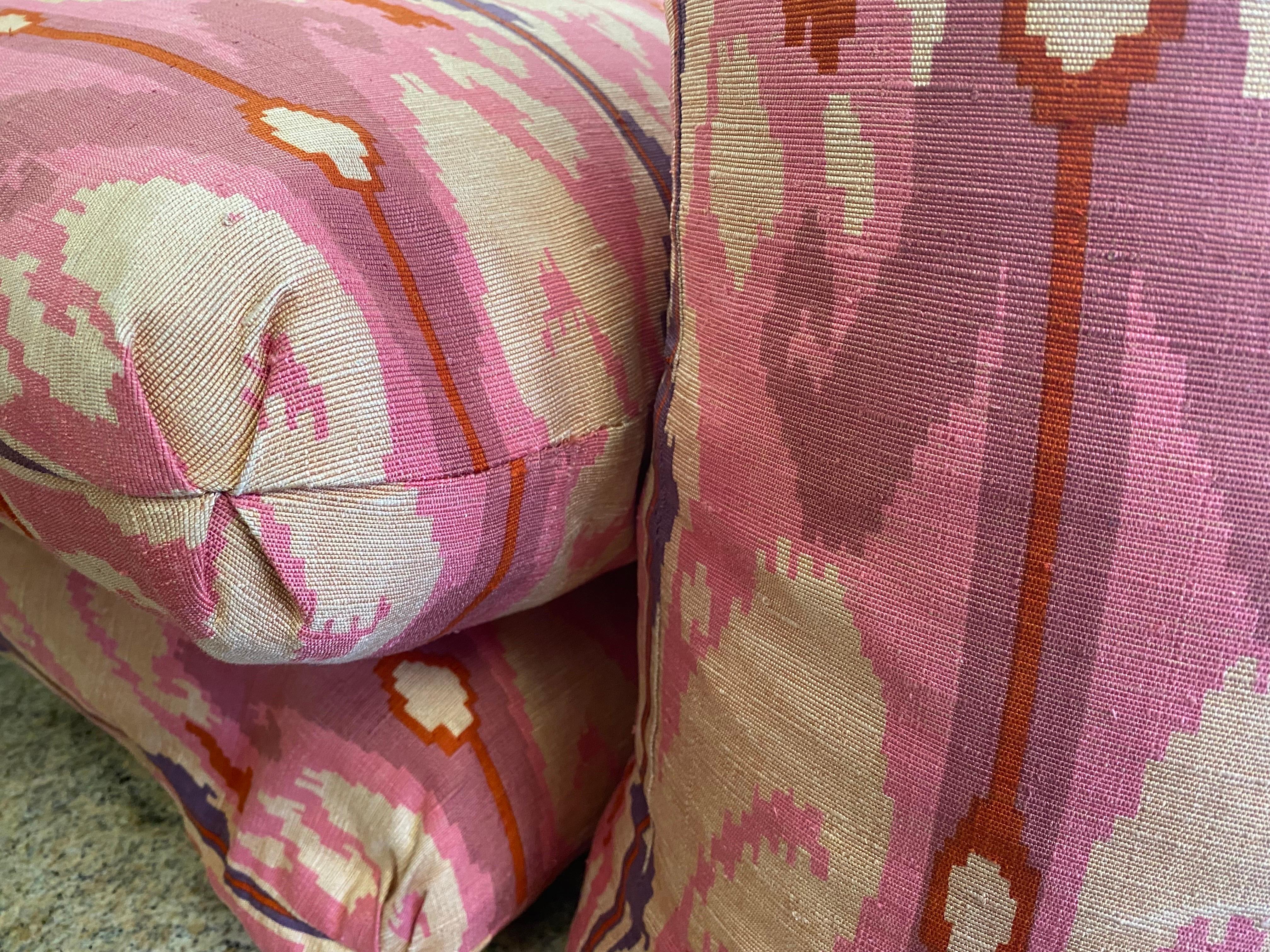 Set of four throw pillows designed by the late Steve Chase. He picked a beautiful bright, modern Ikat print for a living room in Palm Springs, California. I believe they are a silk linen blend. No fabric tag. There are a total of 10 available on