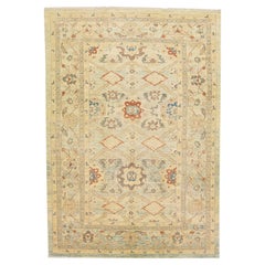 Tapis indien moderne en laine beige fait  la main avec motif gomtrique
