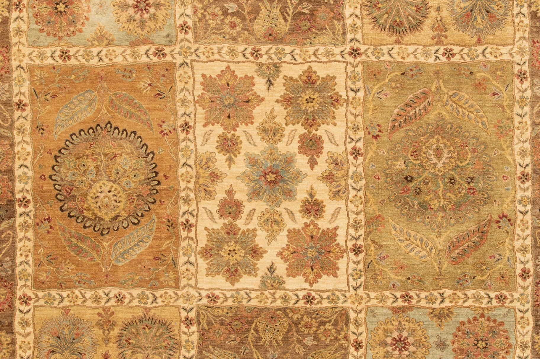 Modern Indian Tabriz style rug with an all-over geometric design. This piece has fine details, great colors, and a beautiful design. It would be the perfect addition to your home. This rug measures 9'1