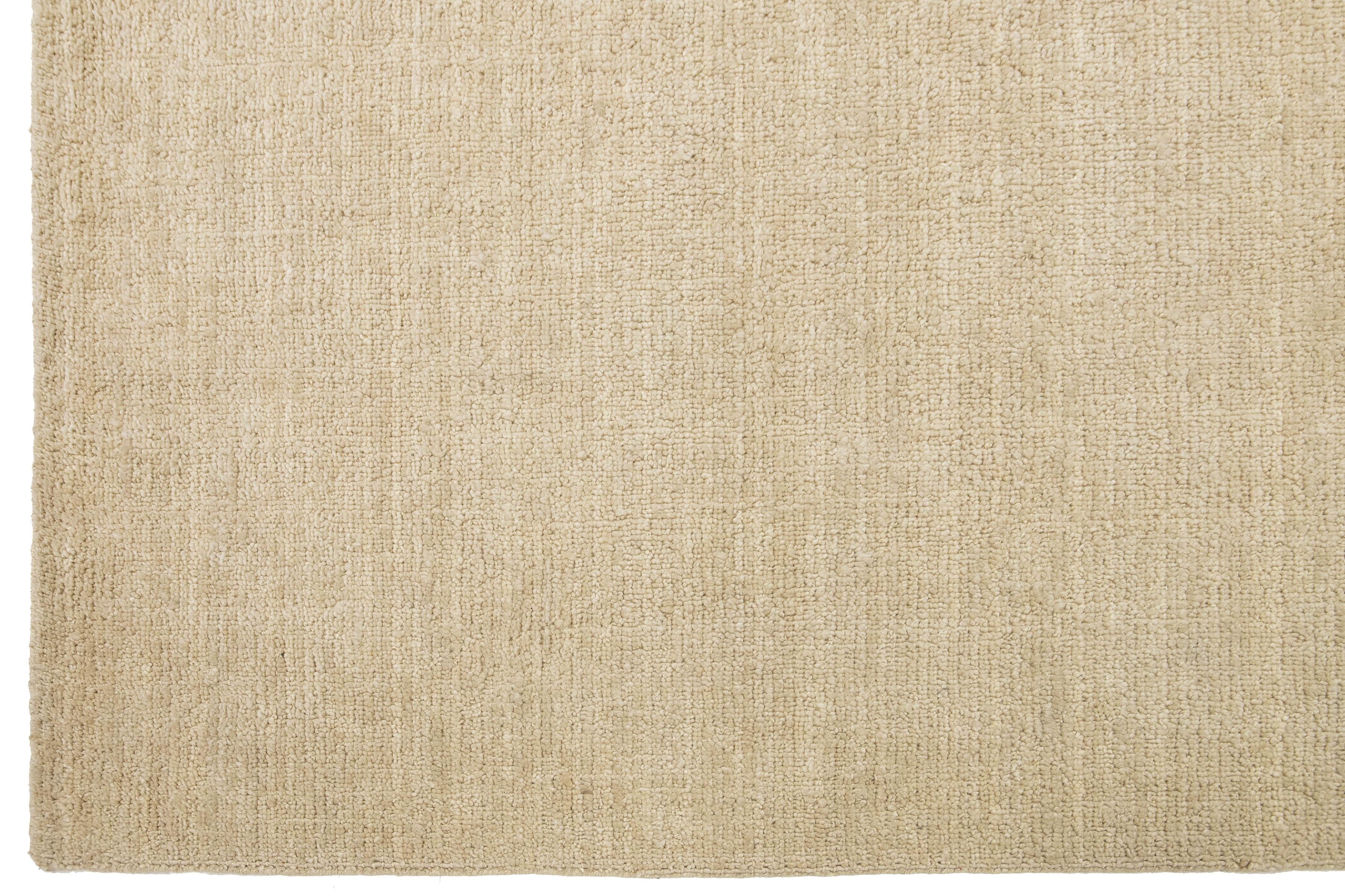 Laine Tapis en laine fait main de texture indienne moderne dans une couleur beige unie en vente