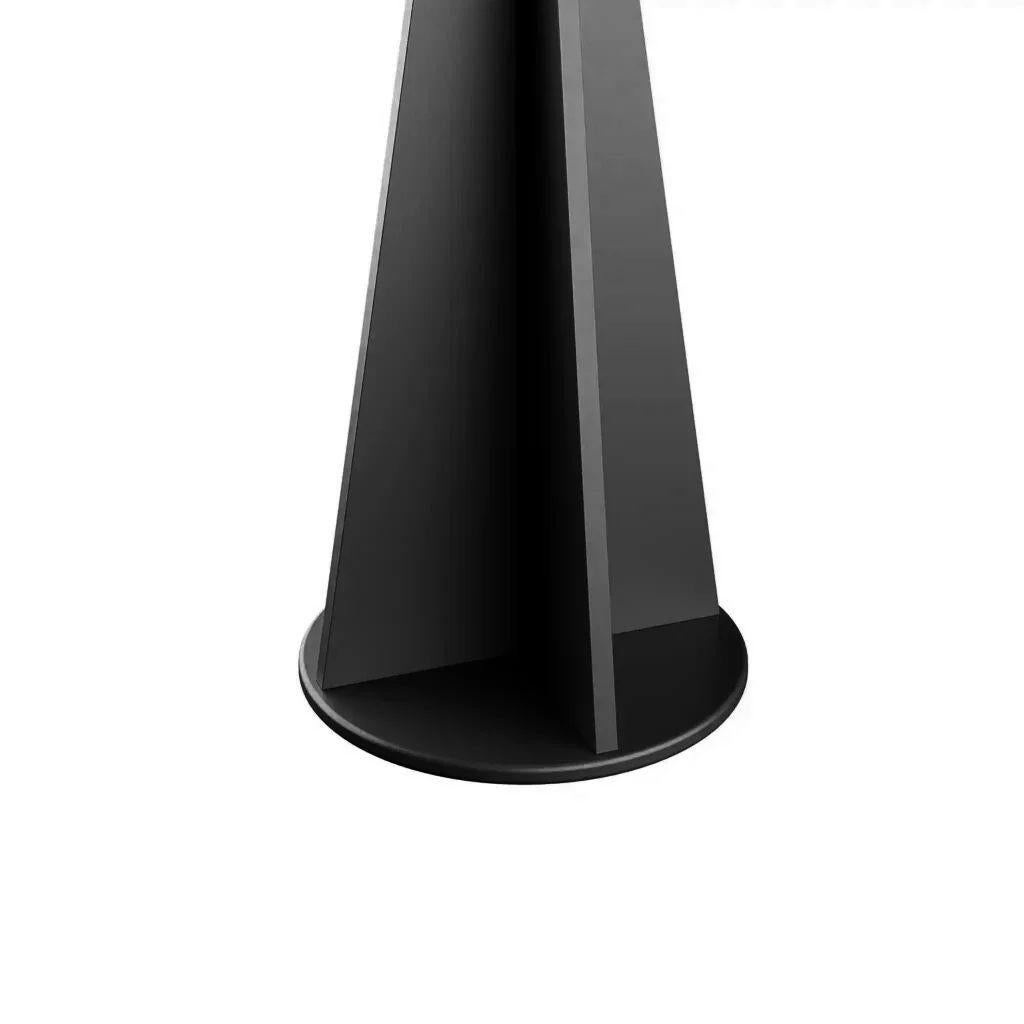 Nan is a Modern Industrial Black Floor Lamp: a bold fusion of industrial charm and modern sophistication. With a Black matte lacquer finish and a sumptuous black velvet lampshade, it exudes rustic allure, while the distinctive brutalist style adds