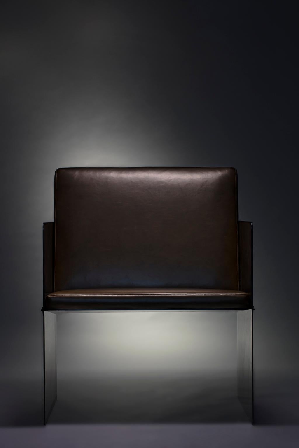 Collection I: Plate chair

Constructed from bold steel plates and secured by bronze wedges, the plate chair is built to last.
Resolute and refined, the deep black, hand-applied finish accentuates textural variations from the Industrial sheet