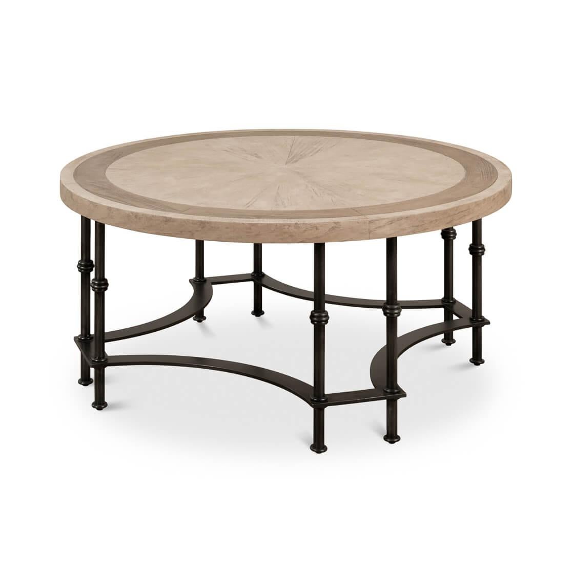 The foundation of this table is a masterpiece of metalwork, boasting both tubular and flat elements intricately forged into a base that embodies artistry and geometric symmetry.

The substantial pine tabletop, presented in a rustic Barn Grey finish,