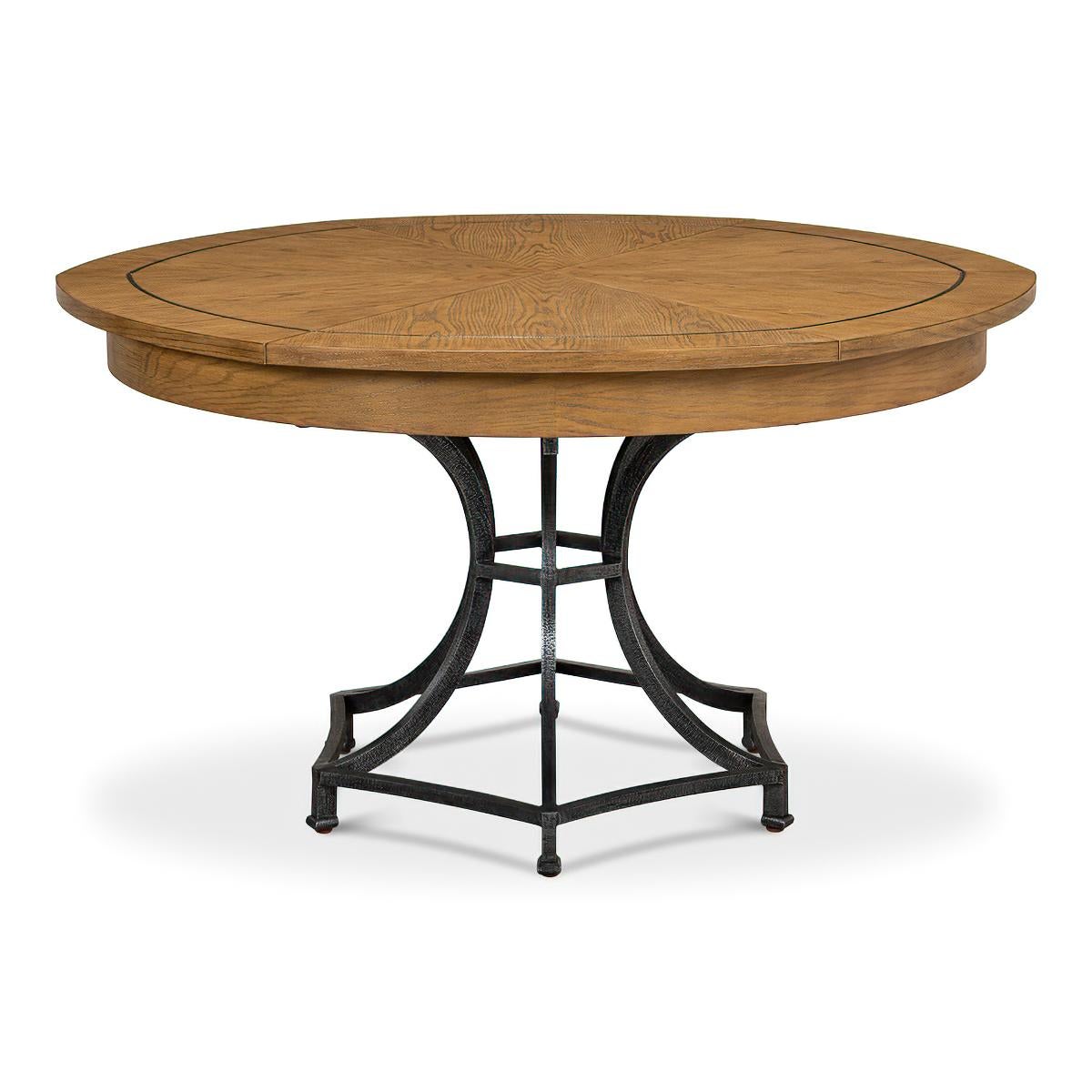 A Modern Industrial style round extending dining table. Featuring a warm beige finish oak top with dark hammered metal inlays on a dark metal pedestal column base.

Open dimensions: 70