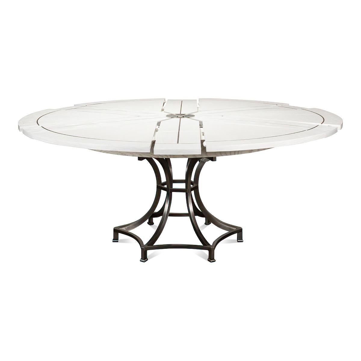 A Modern Industrial style round extending dining table. Featuring a white finish oak top with gunmetal inlays on a metal pedestal column base.

Open dimensions: 70