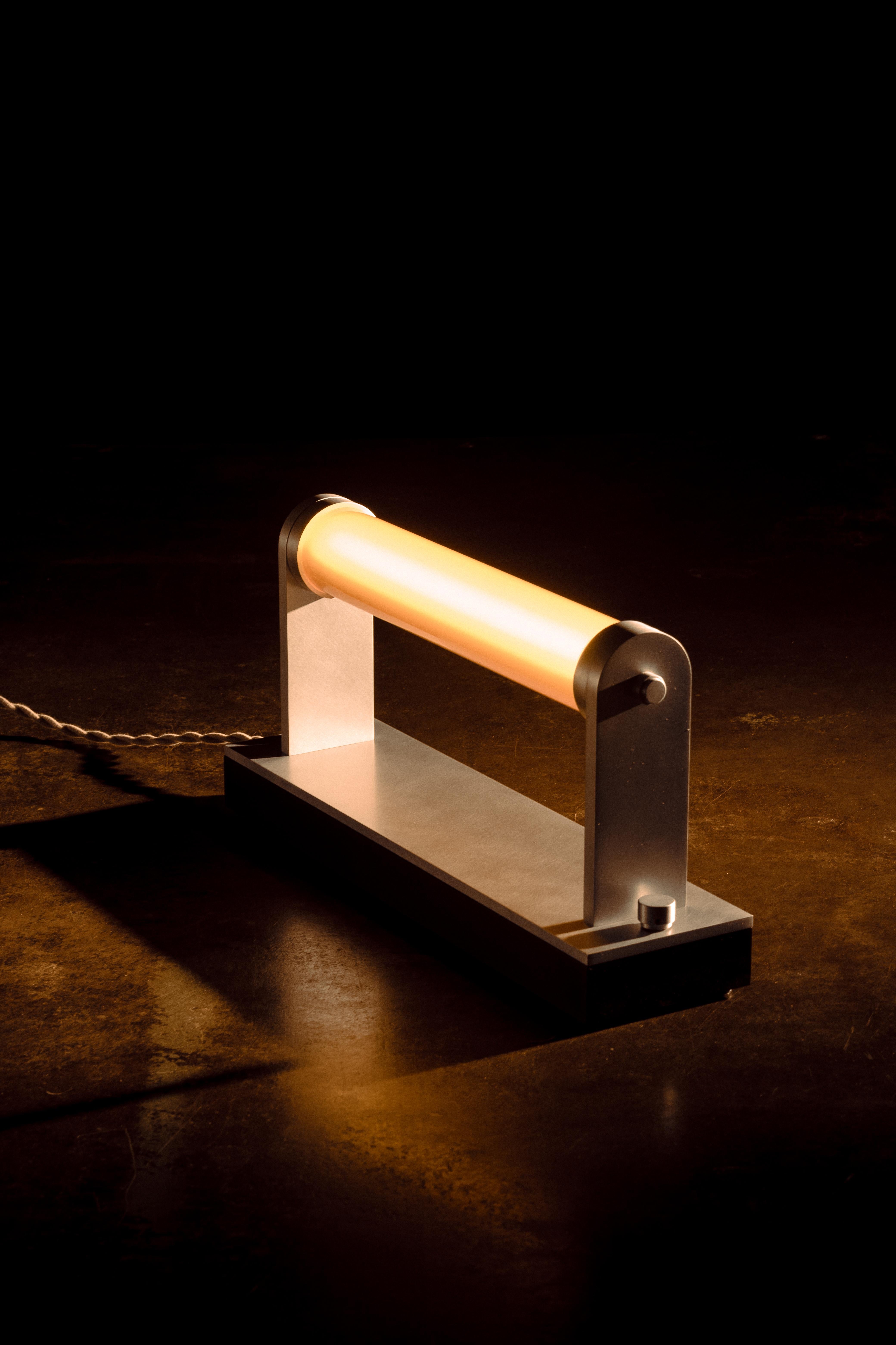 TOMBSTONE LIGHT (SHORT)    

Burnished aluminum, Richite, Delrin, amber borosilicate glass

Dimensions: 15.5” L  4” W  7.6” H    

Weight: 7lbs    

Made-to-order 

