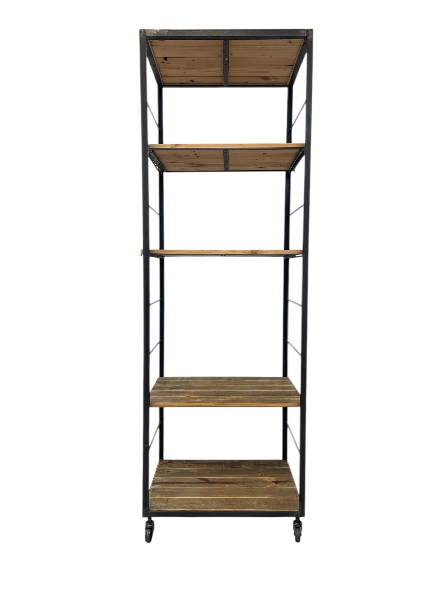 Newly crafted tall shelving unit with a sleek black metal frame and wood shelves. The design combines clean, industrial lines with warm, rustic planks that highlight natural grain variation. The open sides feature horizontal bar details for added