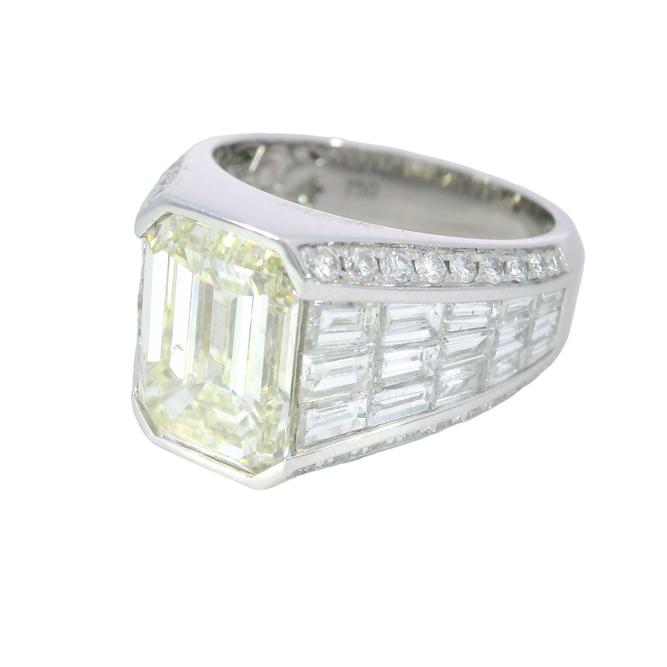 Invisible Set Diamond Emerald Cut Ring ~8.22CTW in 18 Karat White Gold Size 7.5

This extraordinary ~5.1-carat emerald-cut diamond center ring is a statement of pure luxury. The emerald-cut diamond, with its sleek geometry and mesmerizing depth, is