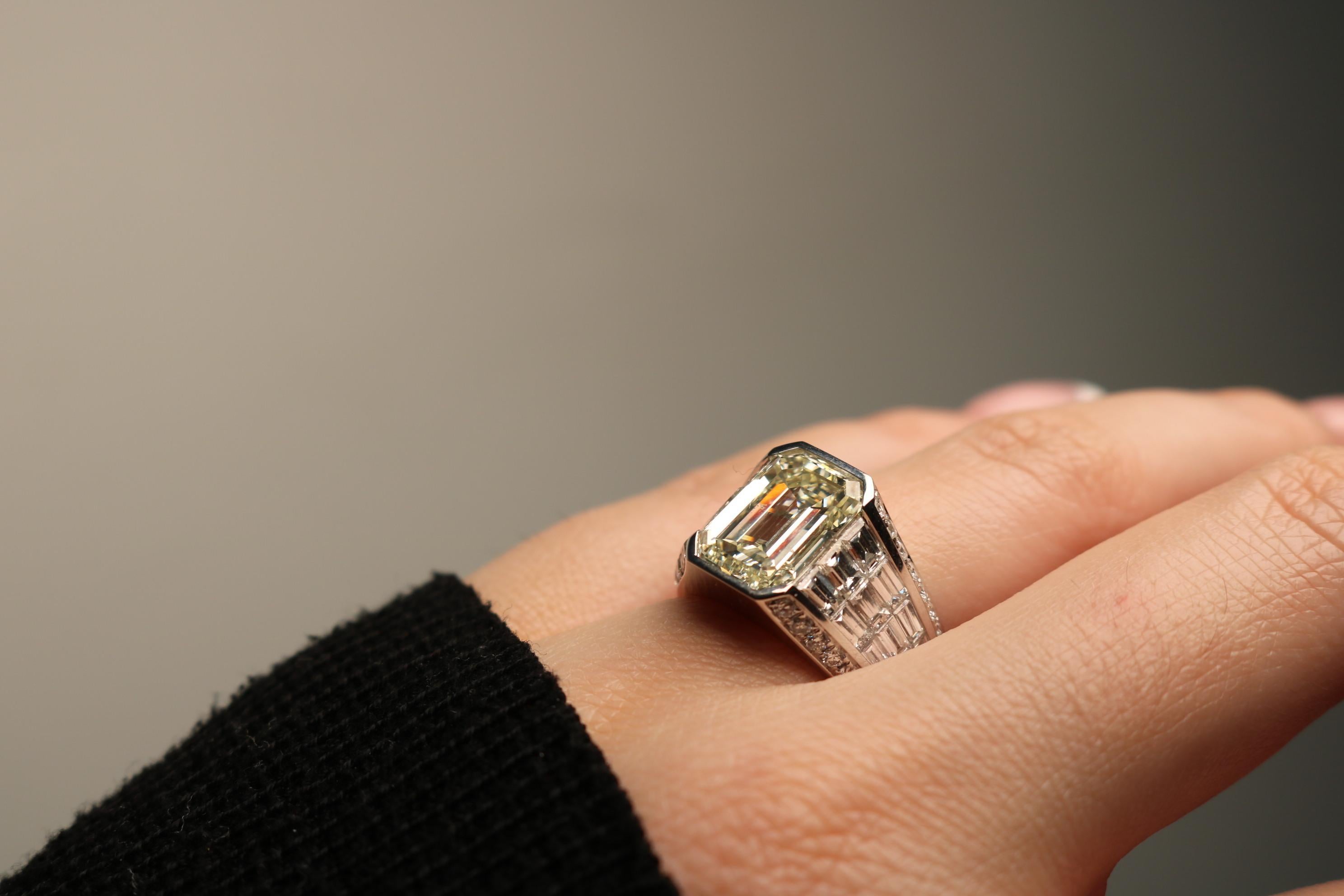 Modern Invisible Set Diamond Emerald Cut Ring ~8.22CTW in 18 Karat White Gold Size 7.5 For Sale