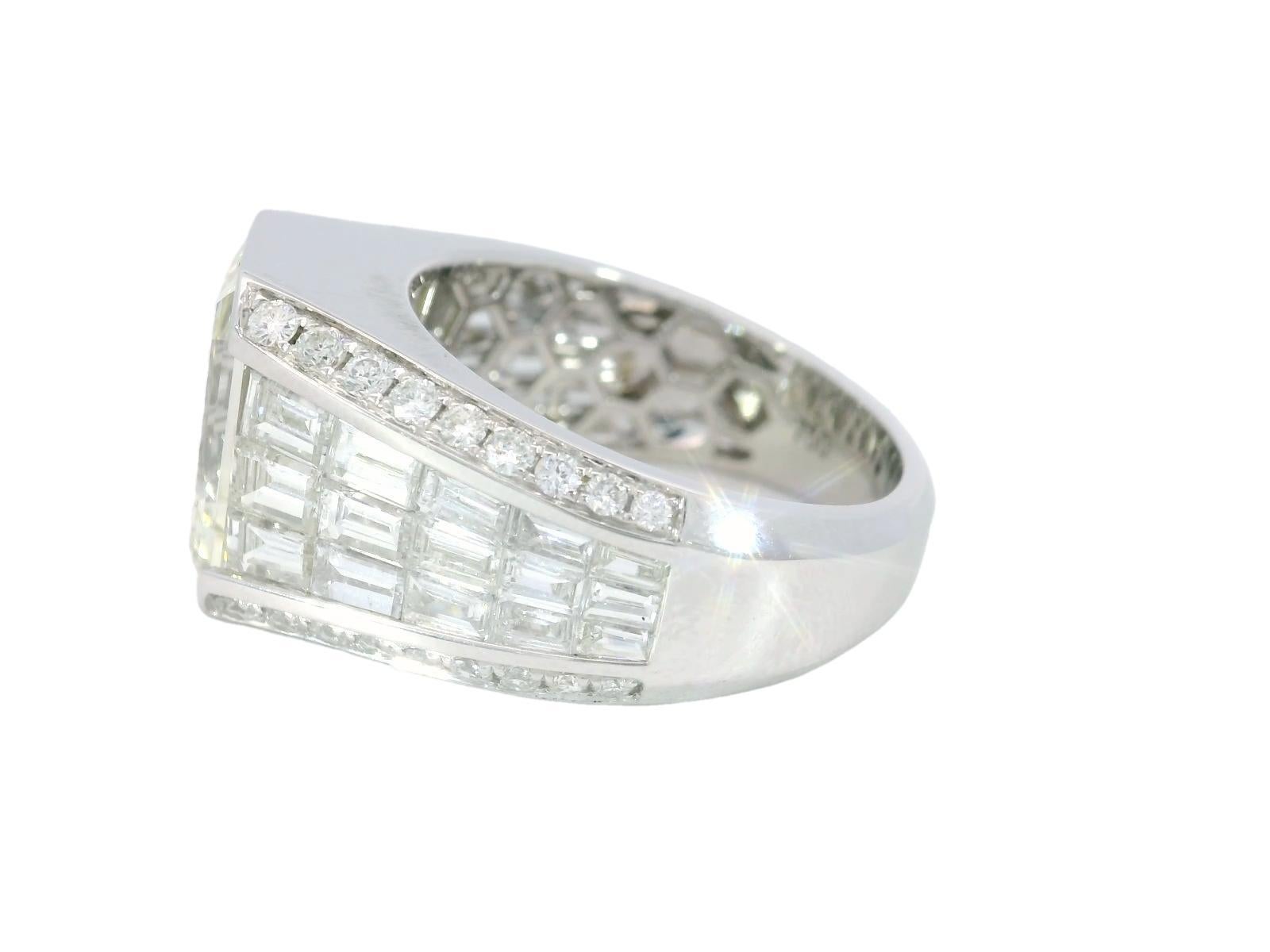 Women's Invisible Set Diamond Emerald Cut Ring ~8.22CTW in 18 Karat White Gold Size 7.5 For Sale