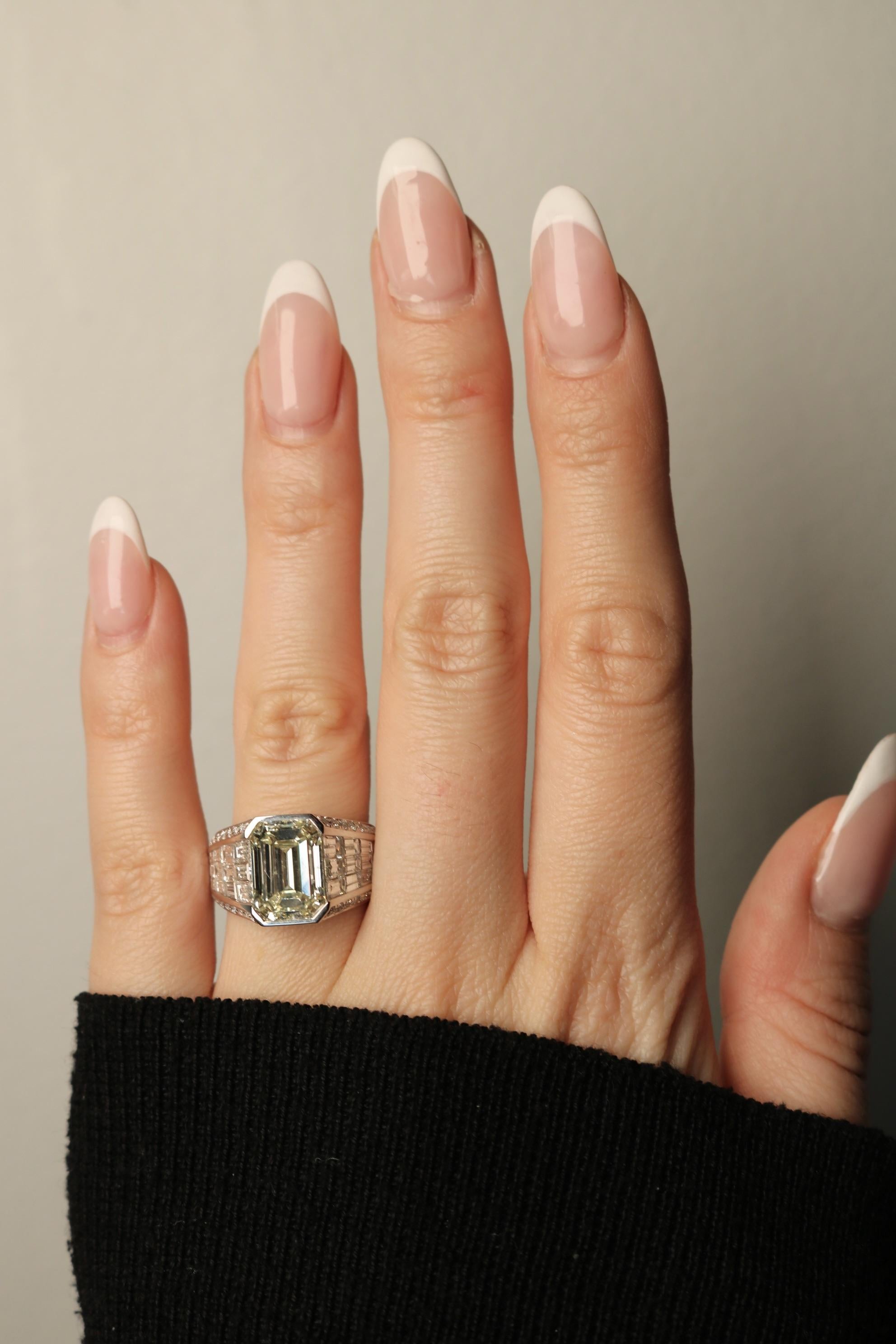 Invisible Set Diamond Emerald Cut Ring ~8.22CTW in 18 Karat White Gold Size 7.5 For Sale 4