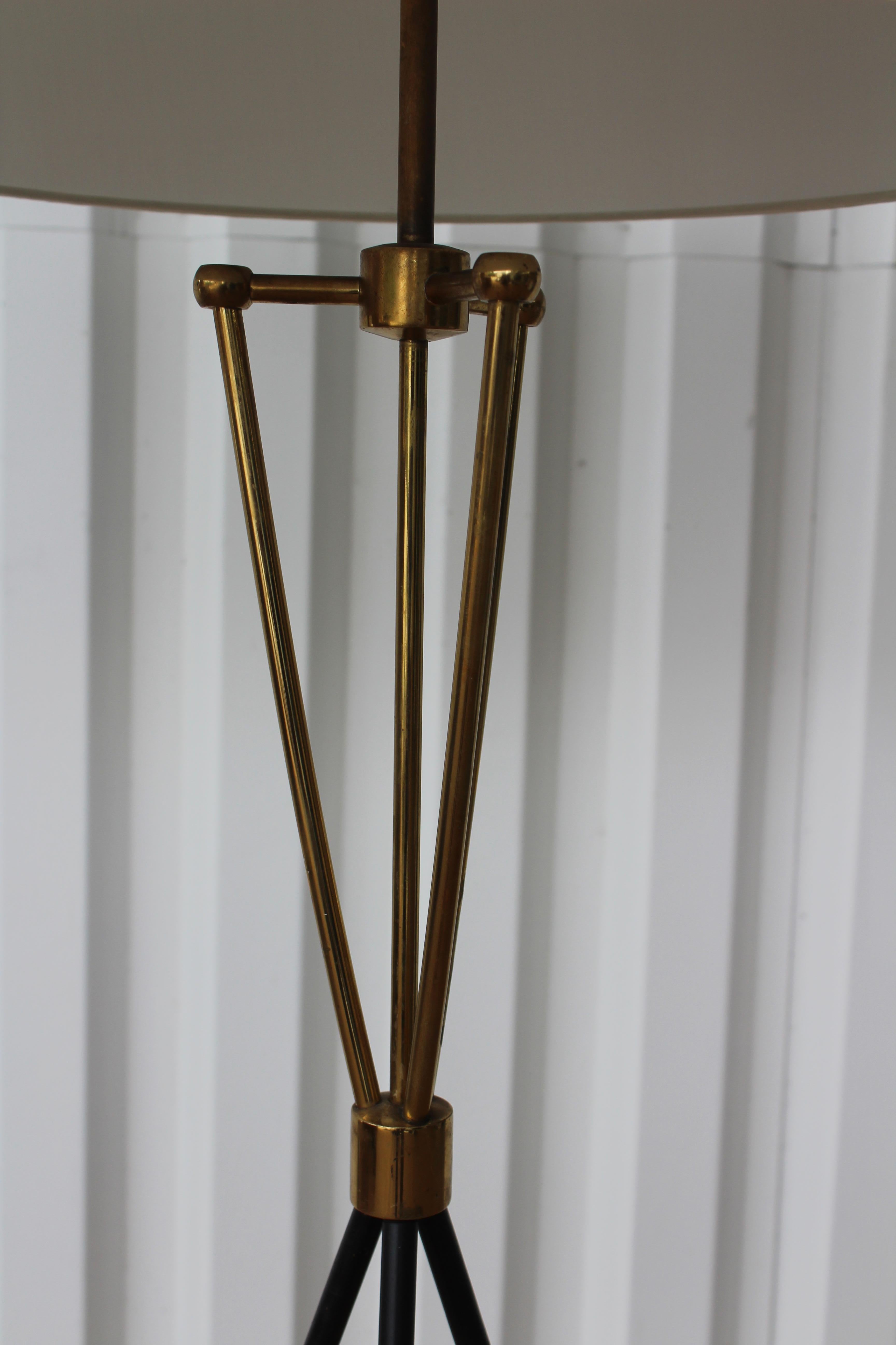 1950s modern brass floor lamp by T.H. Robsjohn-Gibbings. Newly rewired and fitted with a custom silk shade.