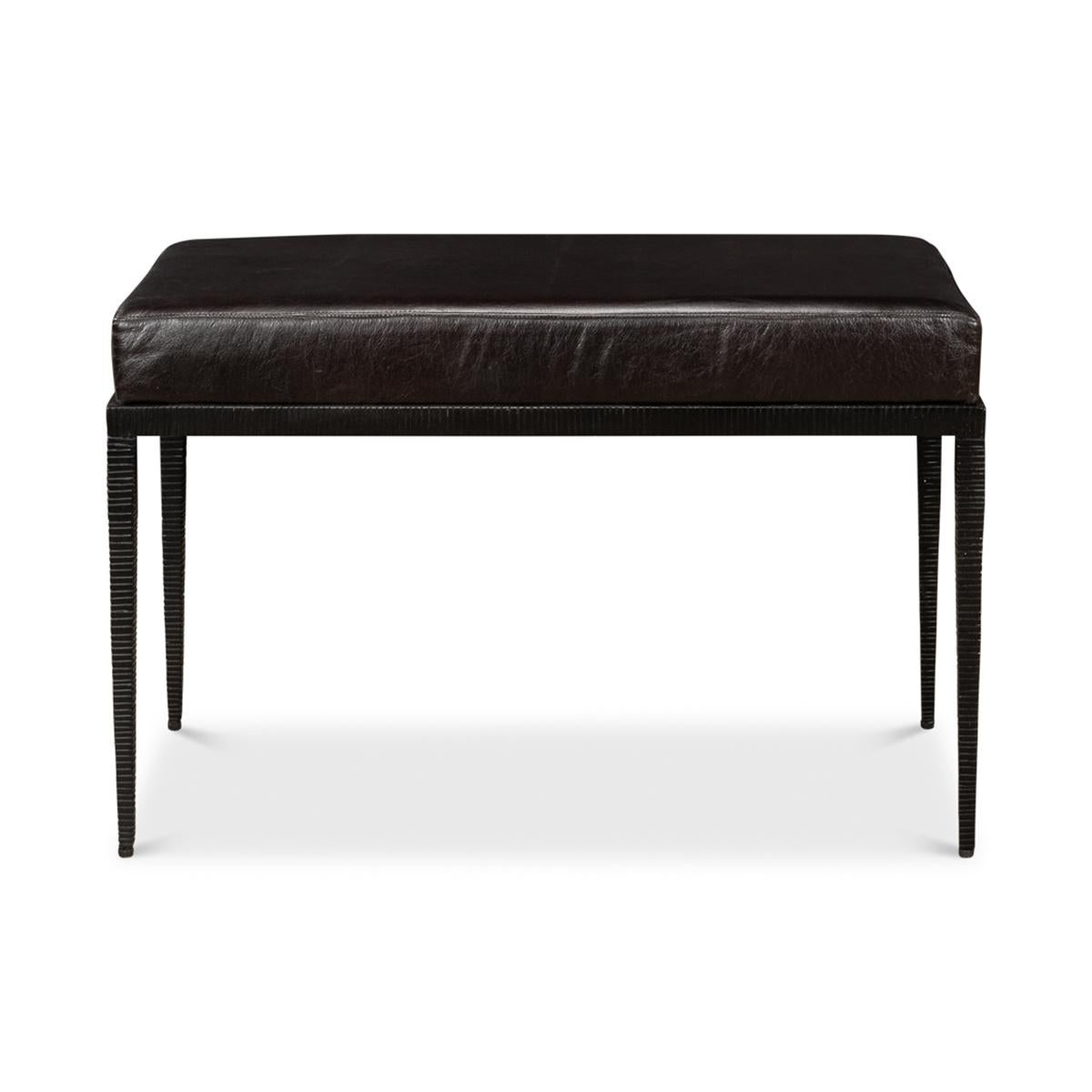 Modern iron and leather bench with a hammered iron modern tapered frame and box leather upholstered seat cushion.

Dimensions 30