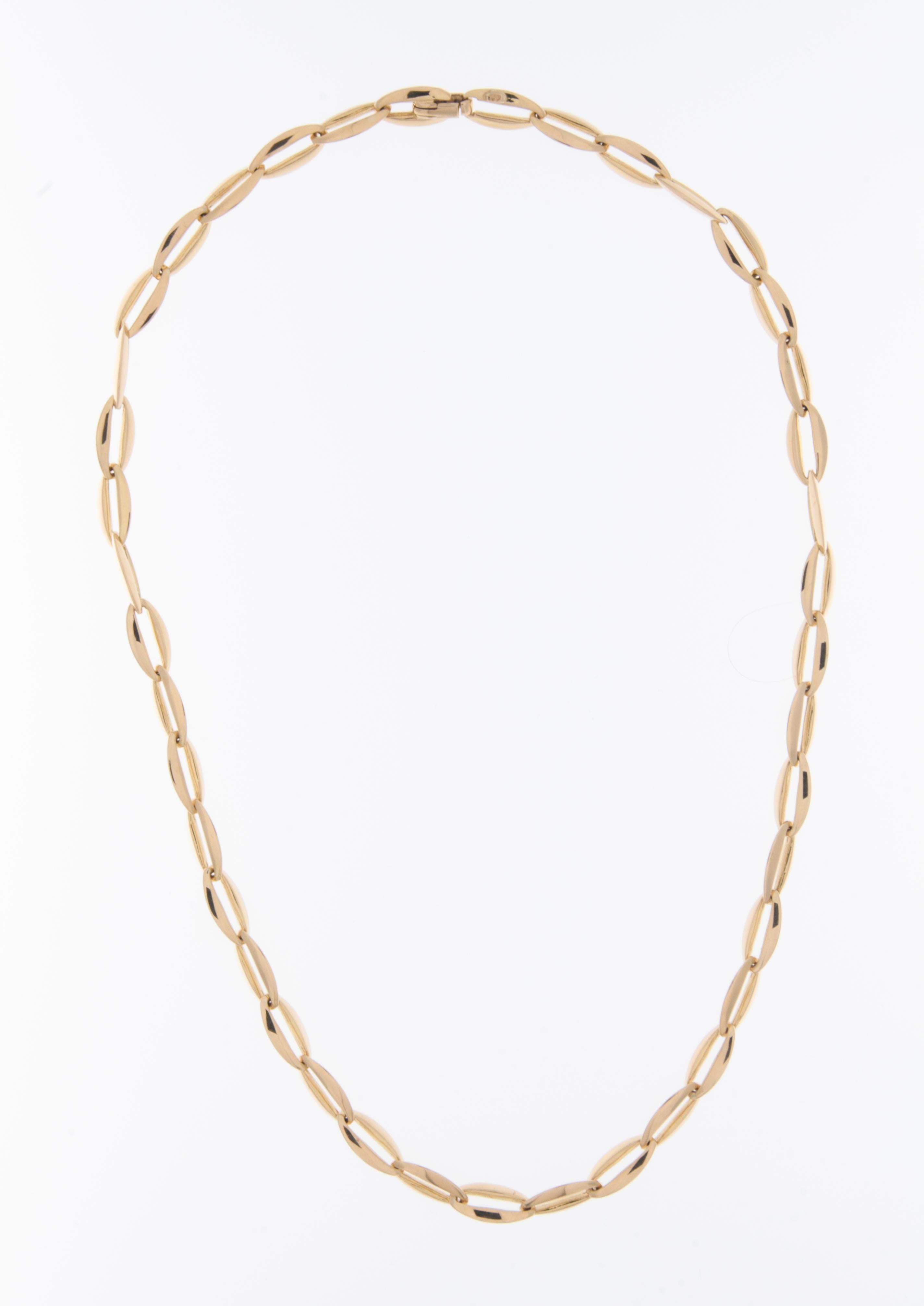 This Modern Italian 18kt Yellow Gold Necklace is a bold and contemporary piece that effortlessly combines luxury with a sleek design. The necklace features large links crafted from high-quality 18kt yellow gold, adding a touch of opulence to the
