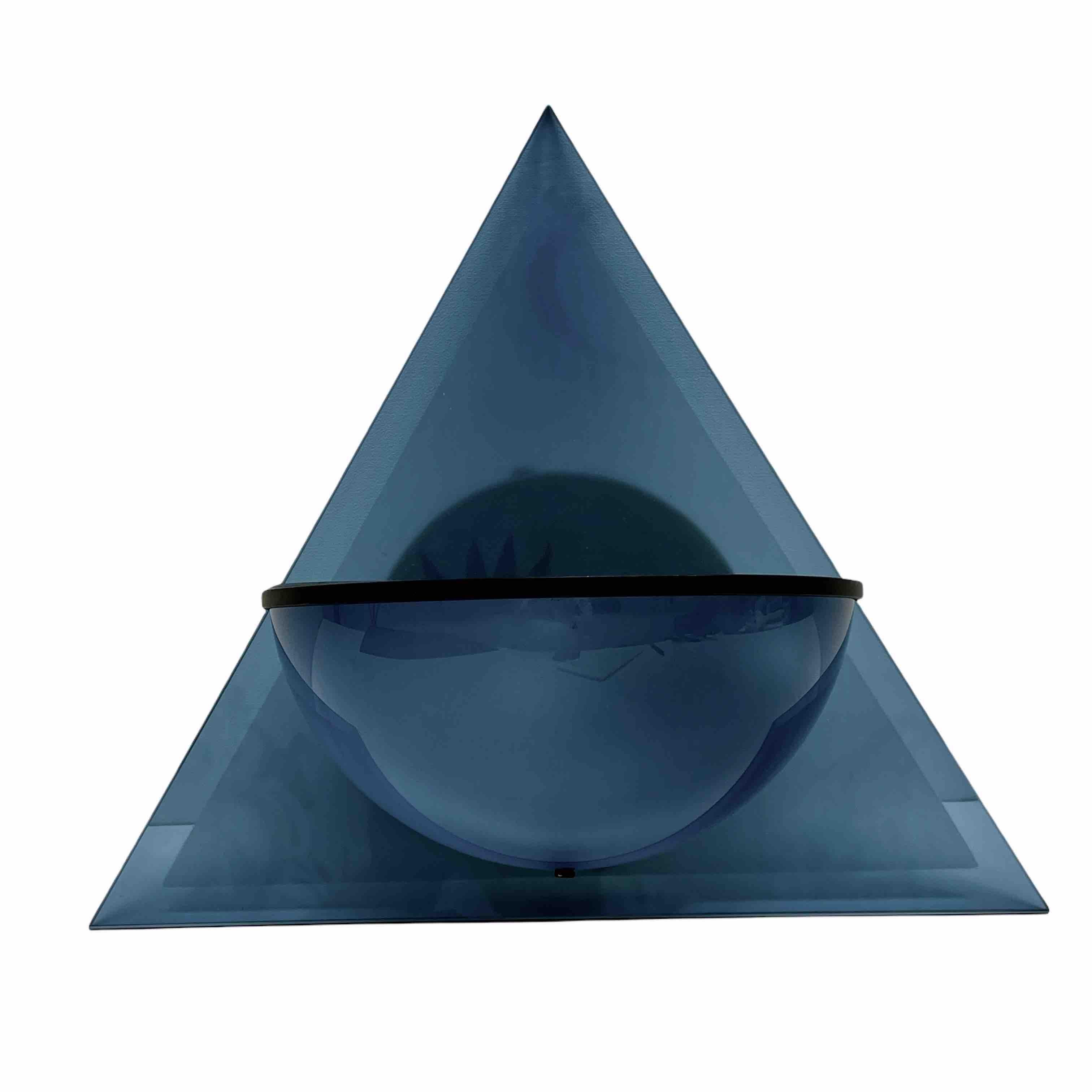 A beautiful sconce or wall lights by Lamperti, Italy. It is made of metal with a nice blue glass. The Fixture requires one European E14 / 110 Volt Light bulb, up to 150 watts. A nice statement piece on your wall.