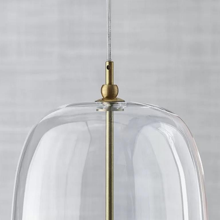 Designed by Studio Design F+B, it is a big suspension lamp part of a lighting project comprehending pendant glass balls floating in the air, making spectacular lighting effects. It is possible to combine two or more Blow pendant lamps, available in