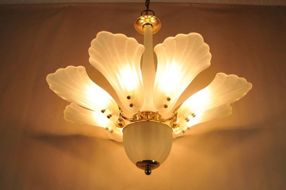 Unique vintage Mid-Century Modern Italian brass and frosted glass leaf eight-light chandelier. Item is unmarked as to the designer but it is more than likely a high quality Italian made chandelier, eight-lights, circa 1970s. Measurements: 26