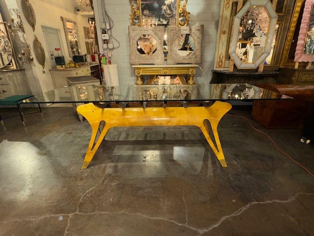 The modern Italian Design Dining Table features interesting wood base and a glass top. This piece embodying a sophisticated and sleek aesthetic. An outstanding table that is sure to be make an impression!!
99L x 32w x 31.5h